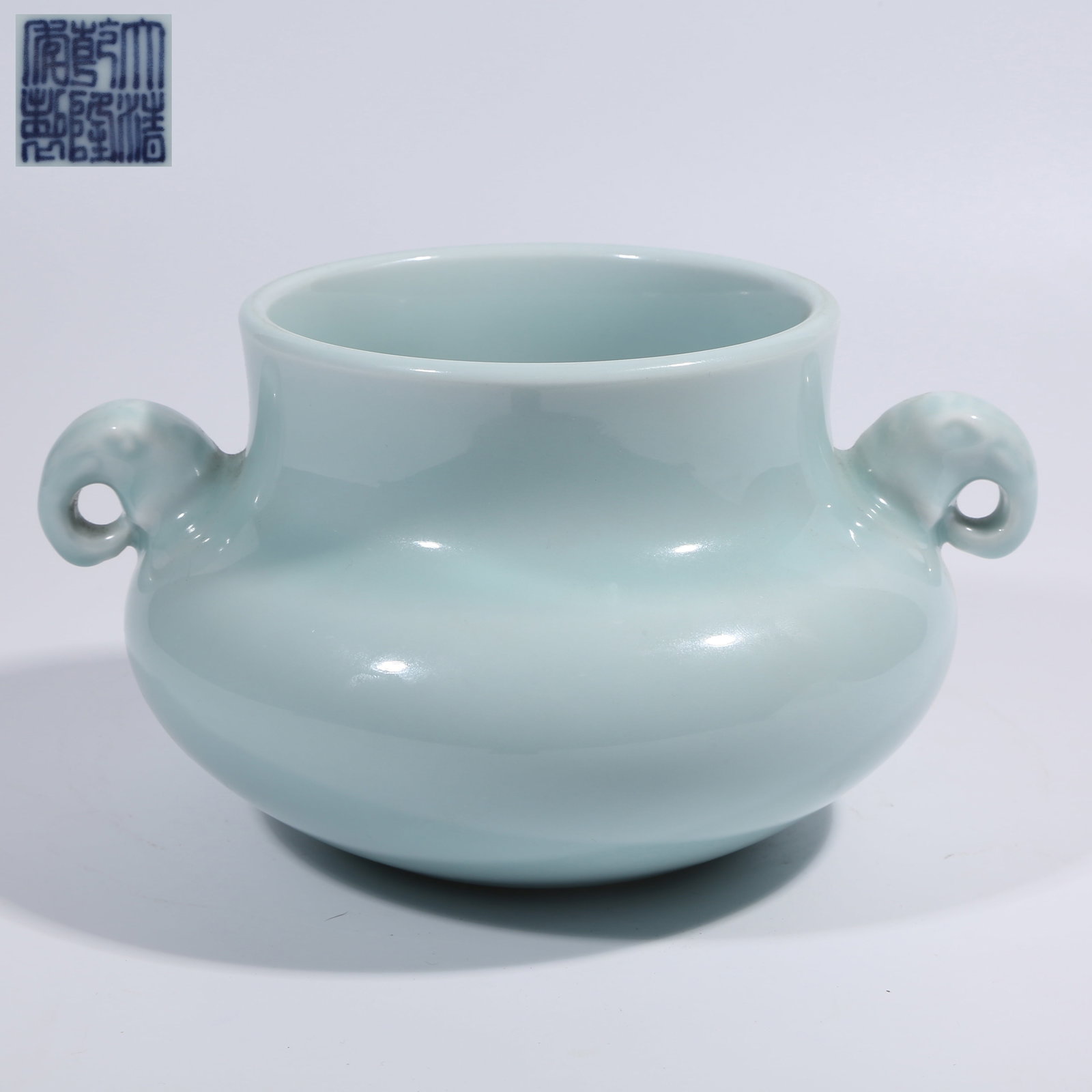 A SKY-BLUE GLAZE ZUN WITH ELEPHANT-HEAD HANDLES (1 of 9)