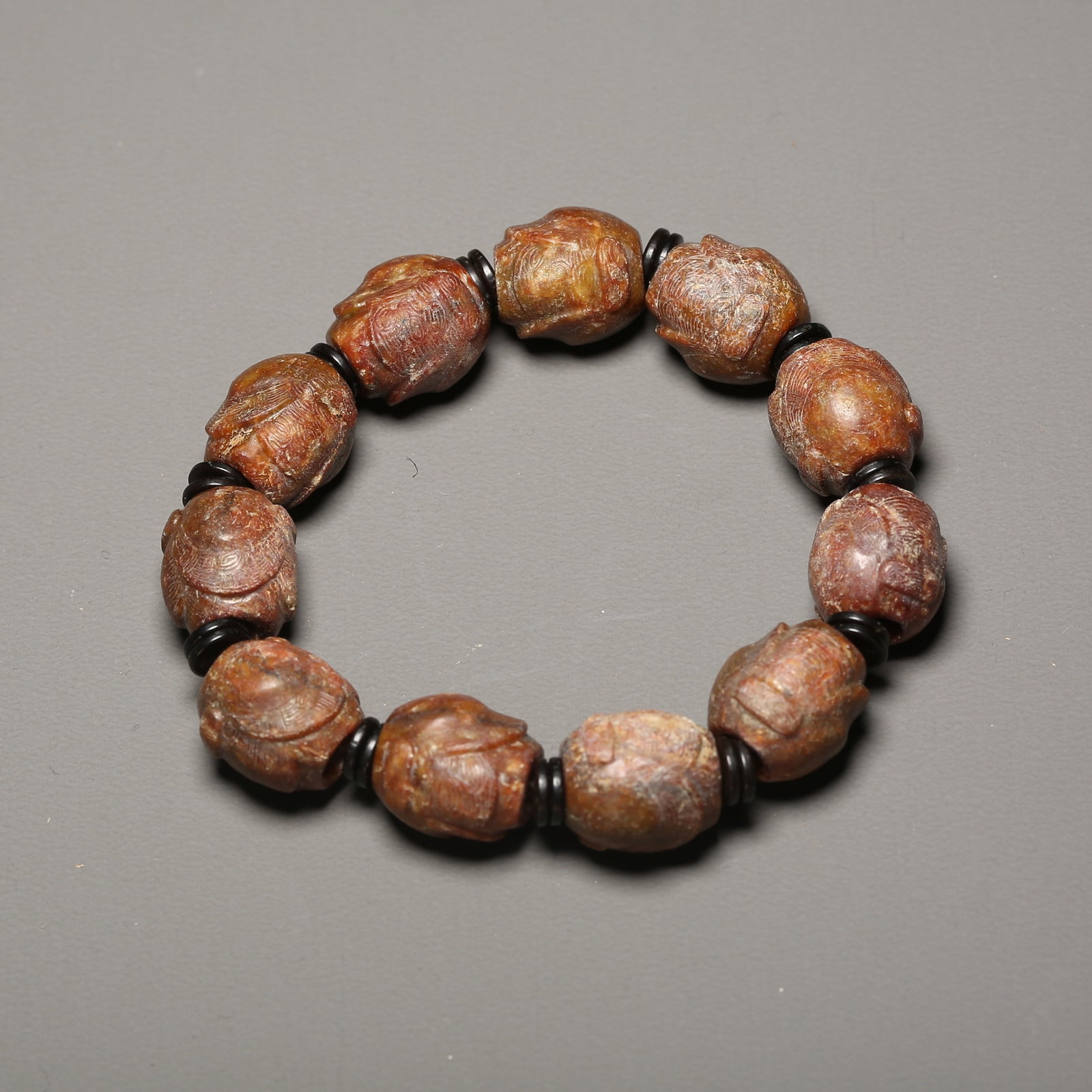 A ARCHAIC JADE LIANGZHU CULTURE CICADA-PATTERN BRACELET: Archaic jade Liangzhu culture cicada-pattern bracelet