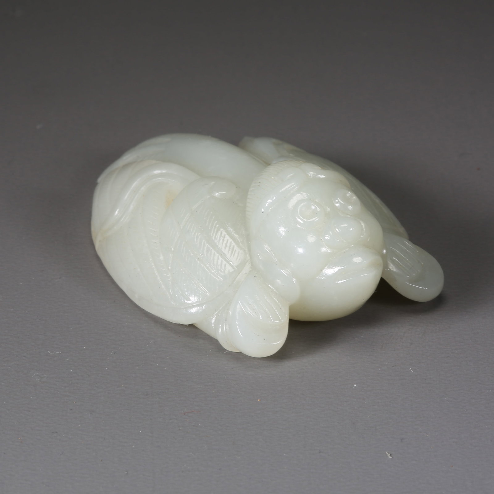 A HETIAN WHITE JADE GARUDA PENDANT: Hetian white jade Garuda pendant