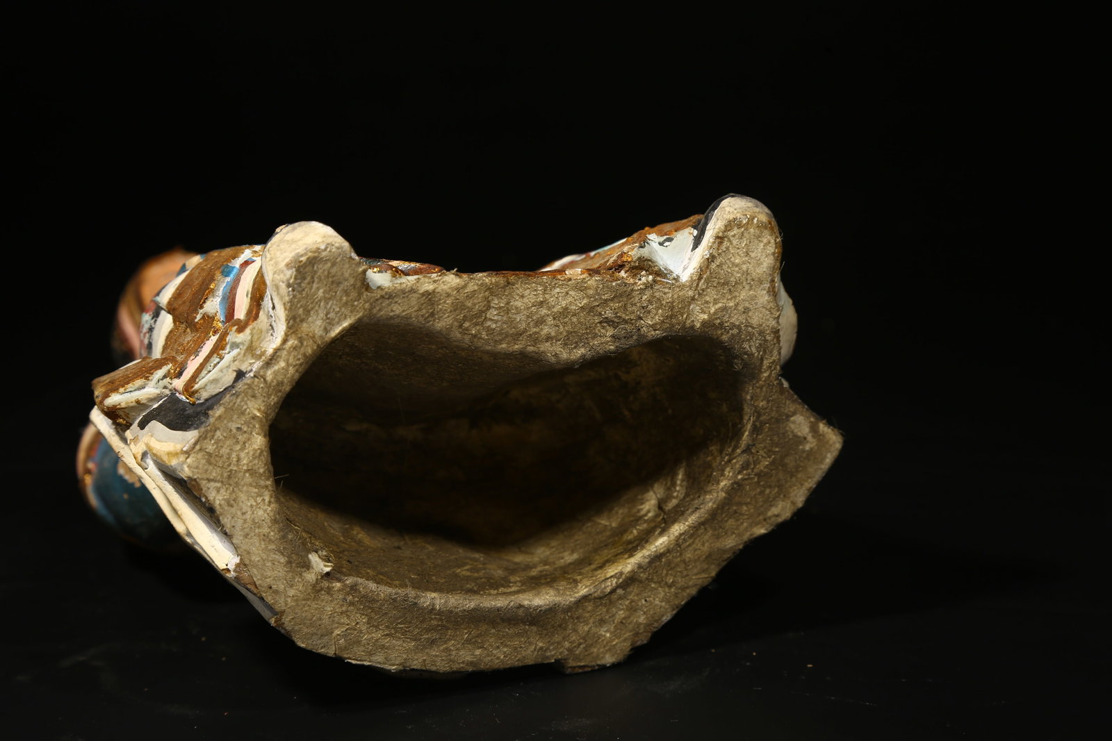 A POLYCHROME PAINTED CLAY FIGURE - 8