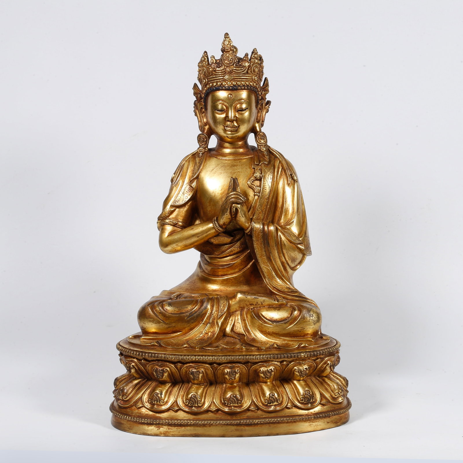 A GILT-BRONZE BUDDHA STATUE (1 of 9)