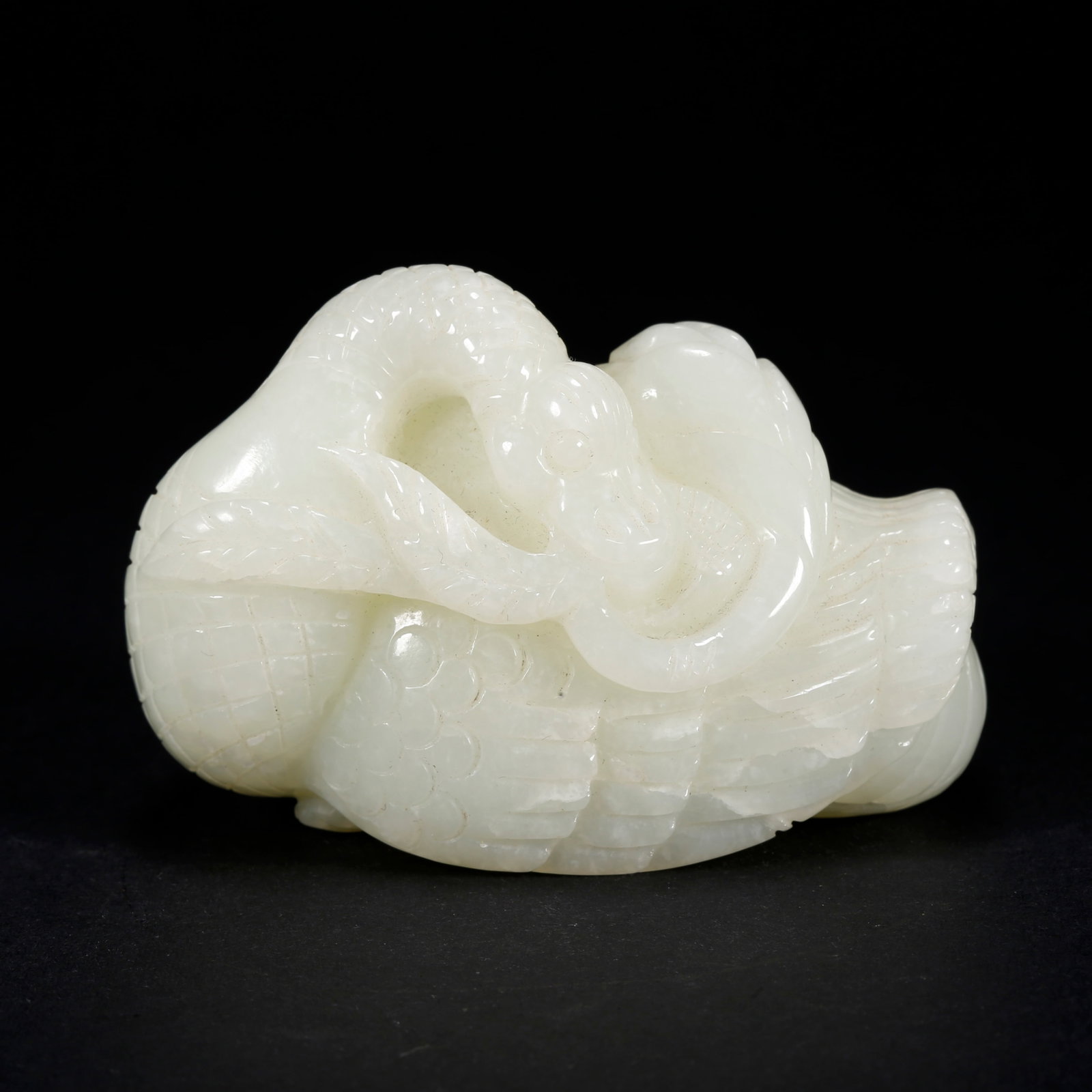 A HETIAN JADE GOOSE-SHAPED FIGURINE: Hetian Jade Goose-Shaped Figurine