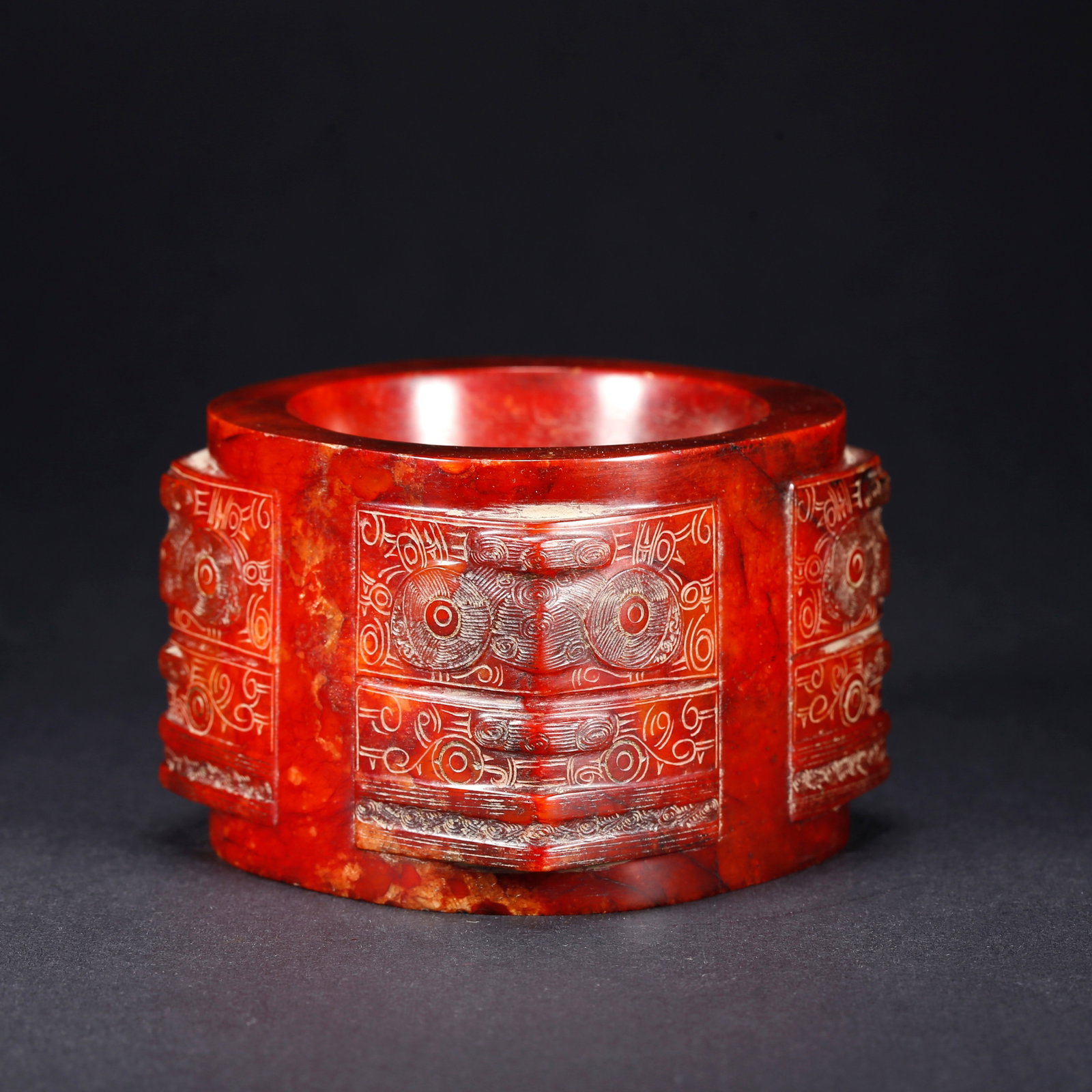 A ANCIENT JADE CONG WITH BEAST FACE MOTIF: Ancient Jade Cong with Beast Face Motif