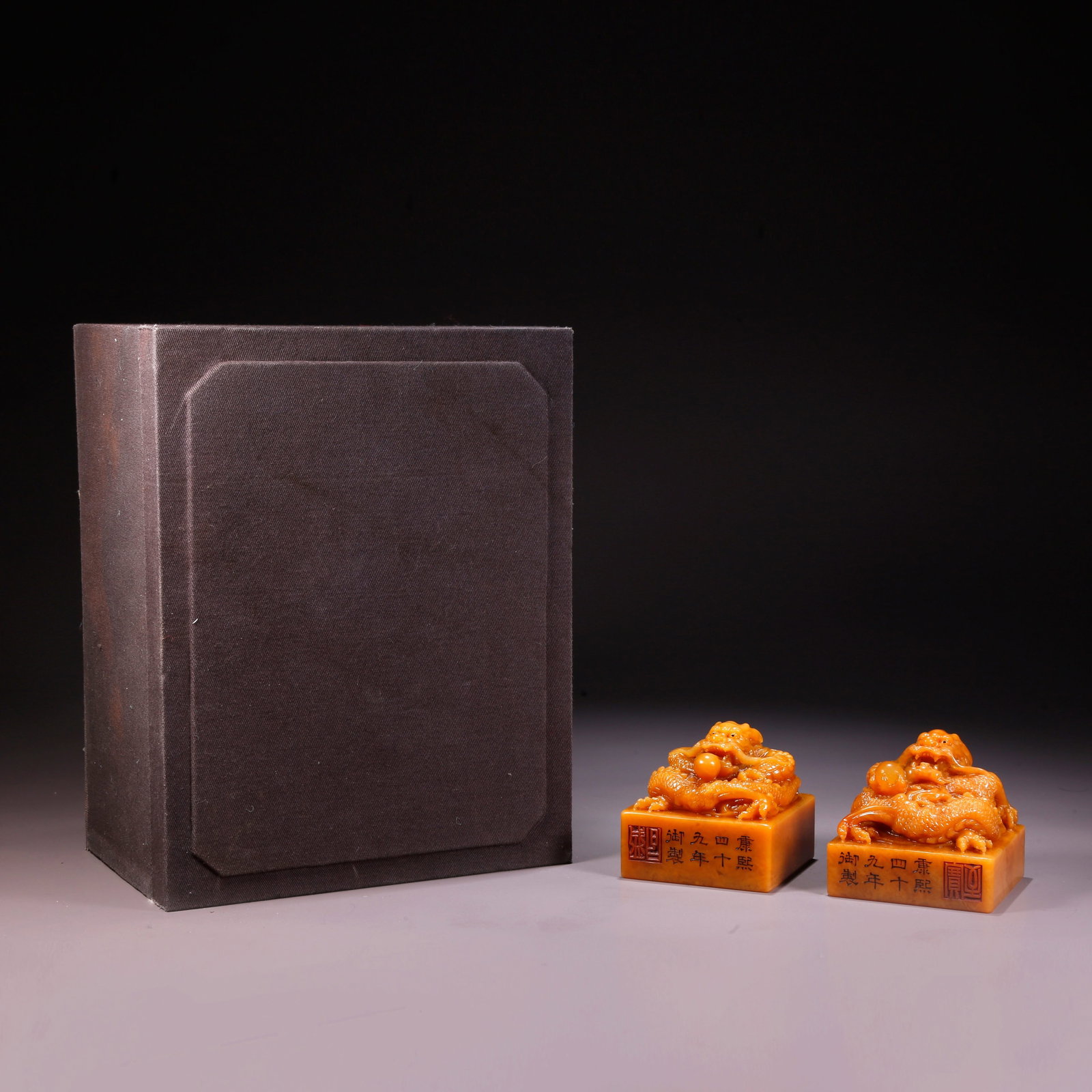 A SHOUSHAN TIANHUANG STONE DRAGON-HEAD SEAL (PAIR): Shoushan Tianhuang Stone Dragon-Head Seal (Pair)
