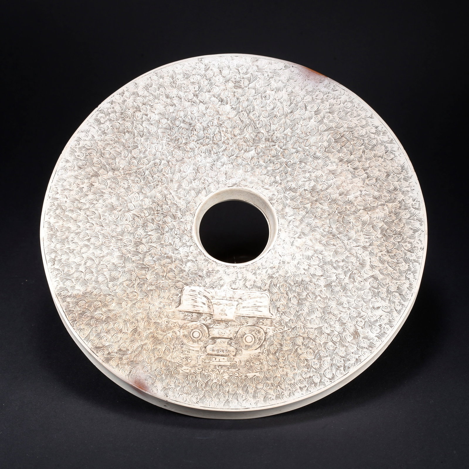 A HETIAN JADE BI DISC WITH BEAST FACE MOTIF (1 of 8)
