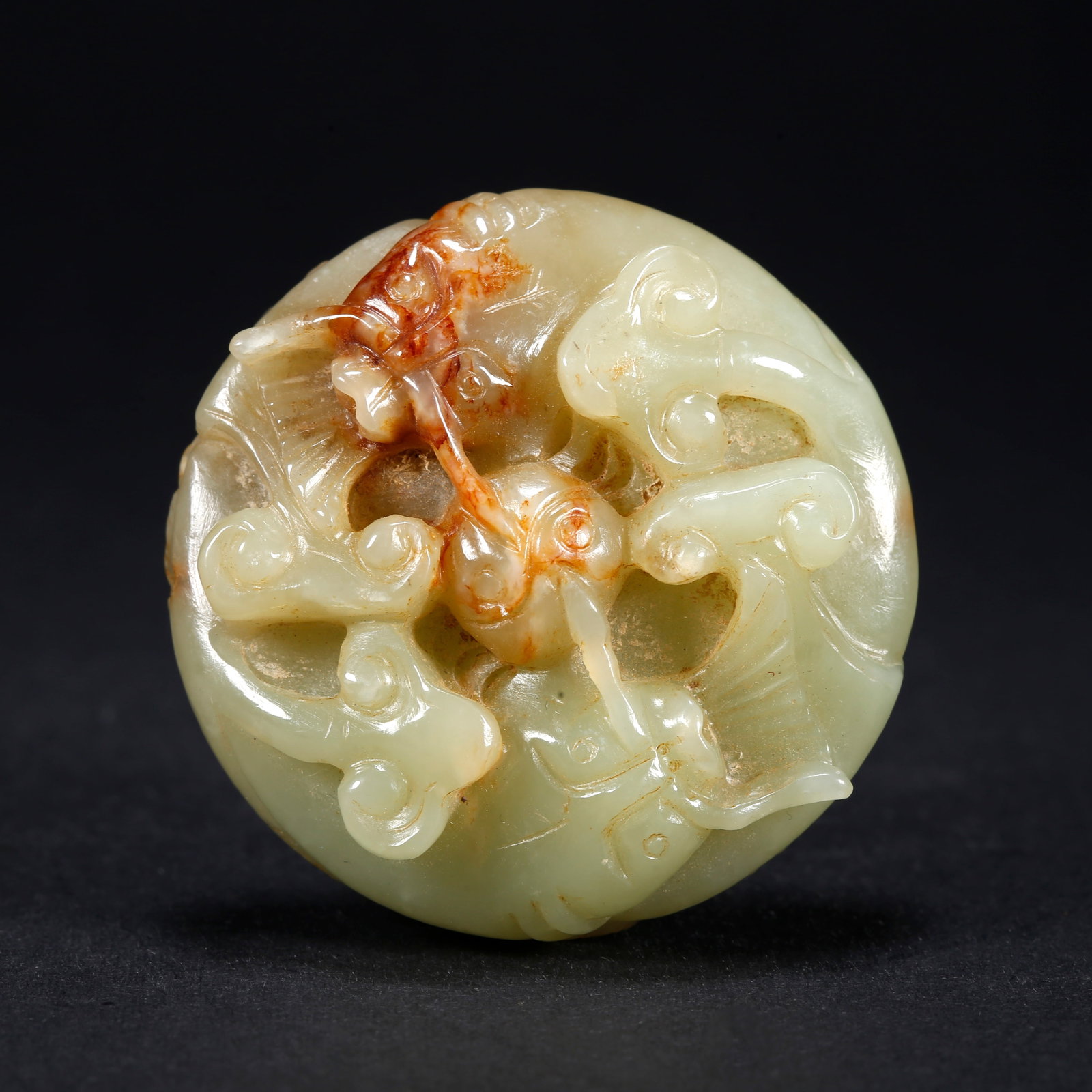 A HETIAN YELLOW JADE PENDANT WITH TWO FISH PLAYING AMONG LOTUS: Hetian Yellow Jade Pendant with Two Fish Playing Among Lotus