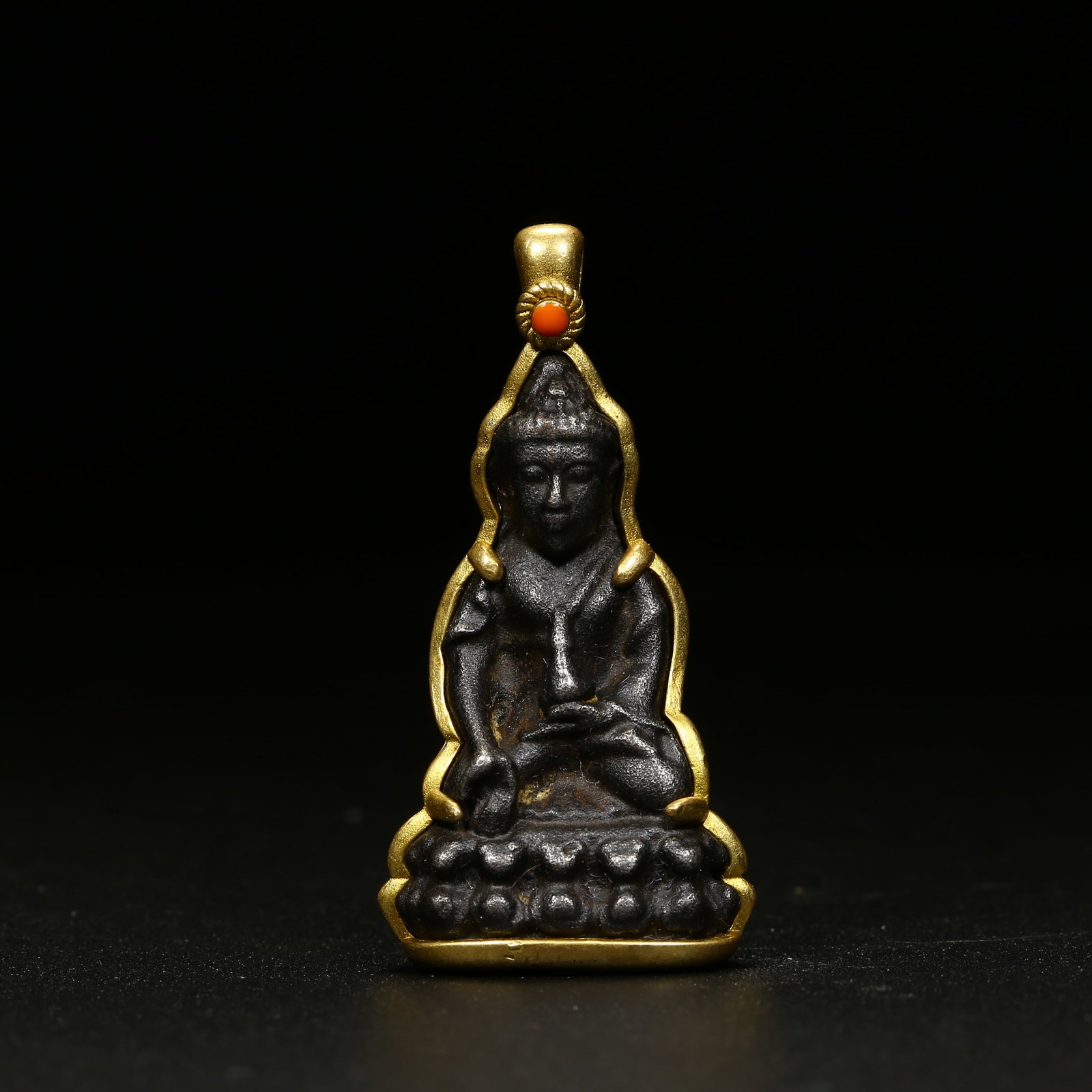 A IRON PORTABLE FIGURE OF RATNASAMBHAVA BUDDHA (1 of 8)