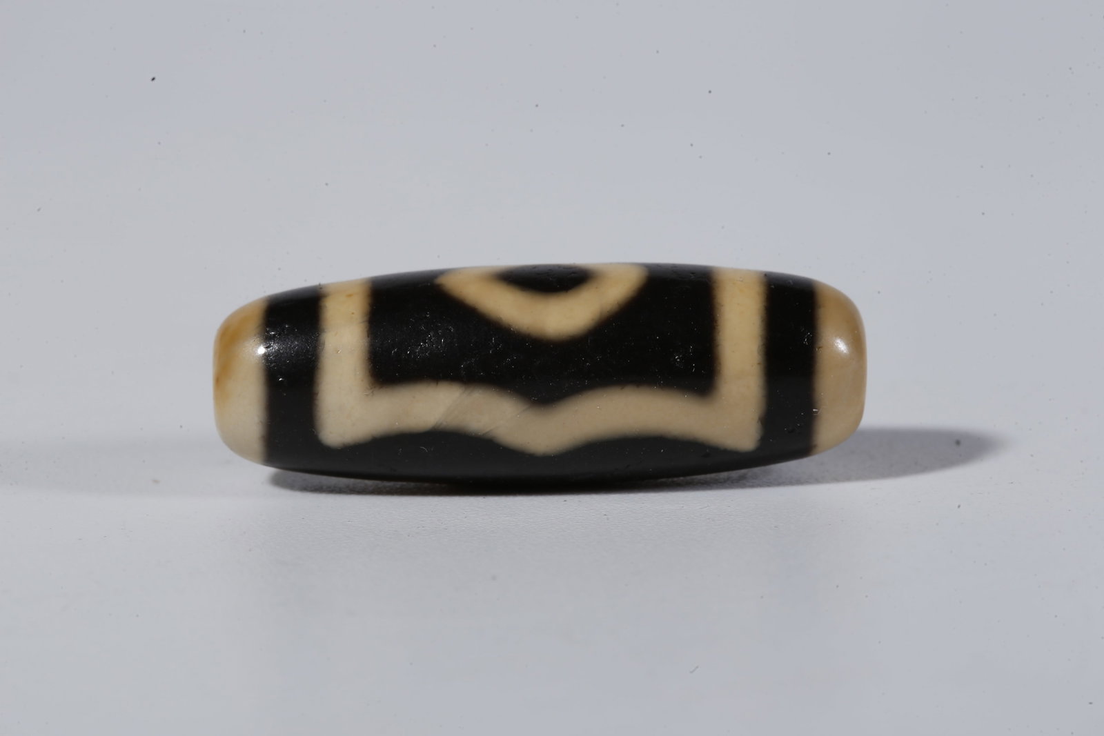 A THREE-EYED DZI BEAD - 2