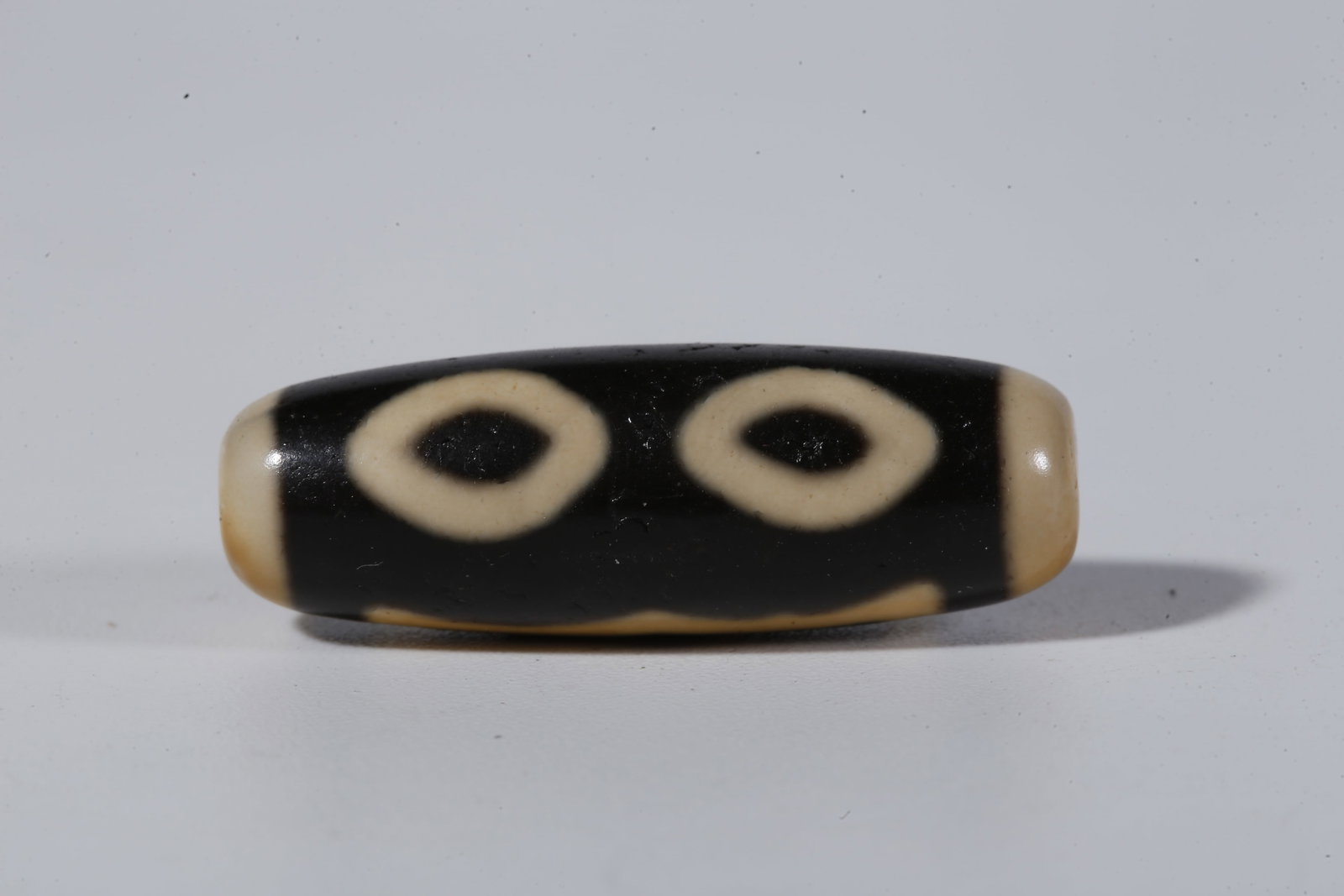 A THREE-EYED DZI BEAD - 4