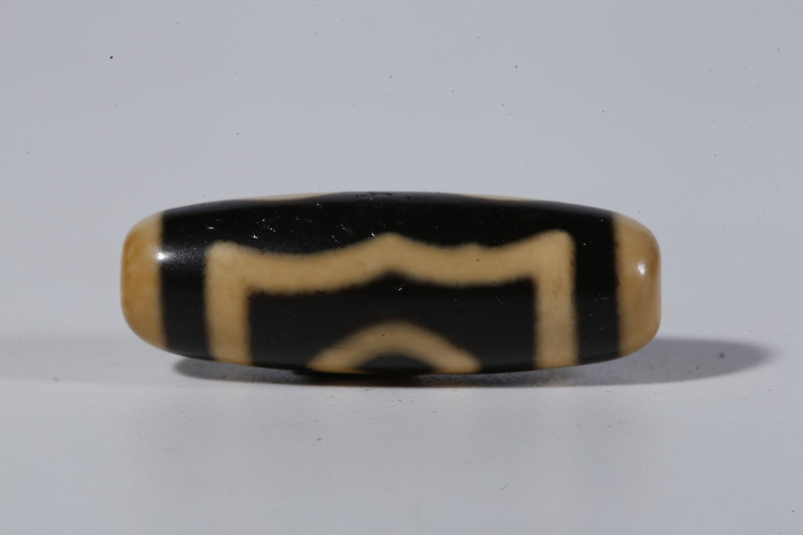 A THREE-EYED DZI BEAD - 5