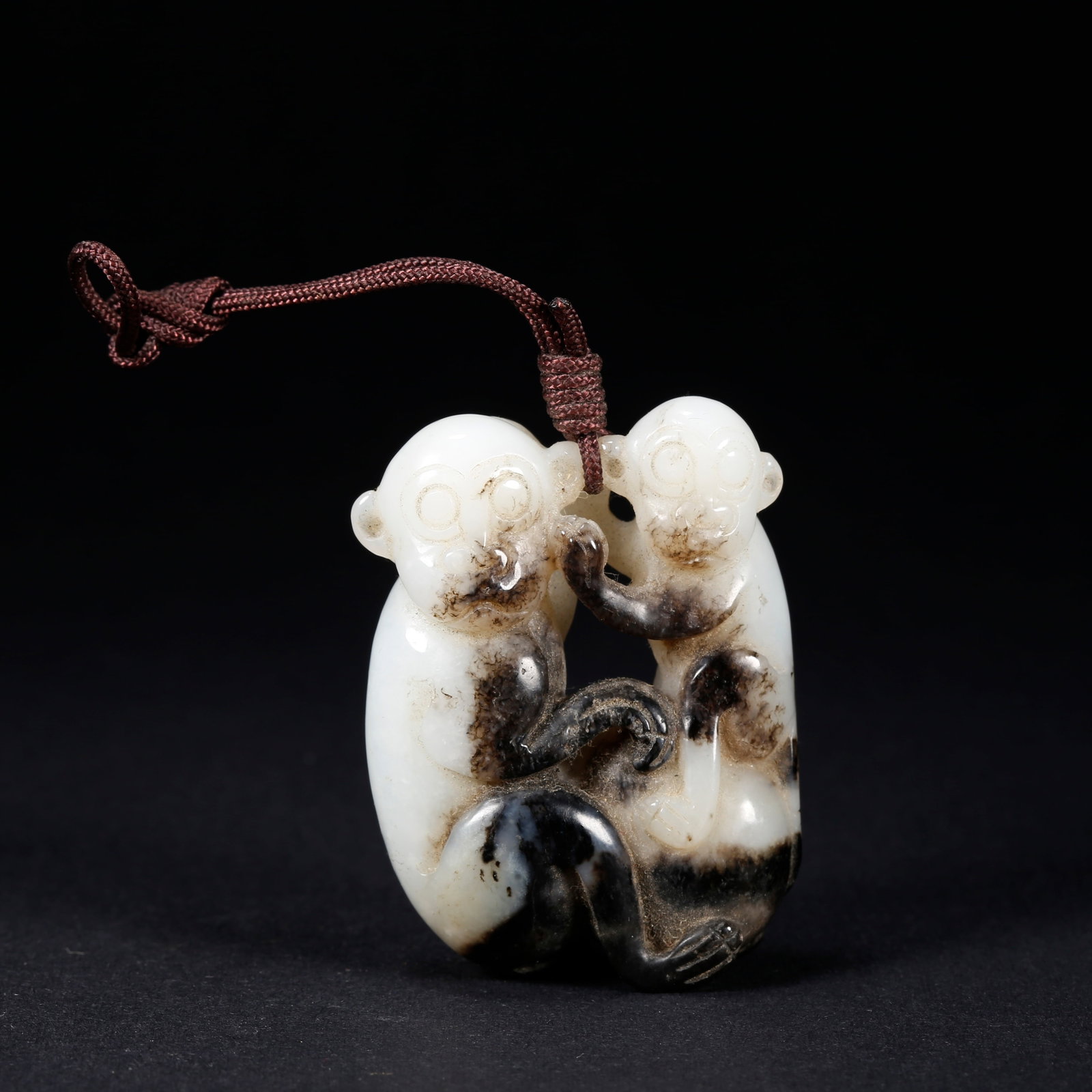A HETIAN JADE MONKEY-SHAPED HANDLE: Hetian Jade Monkey-Shaped Handle