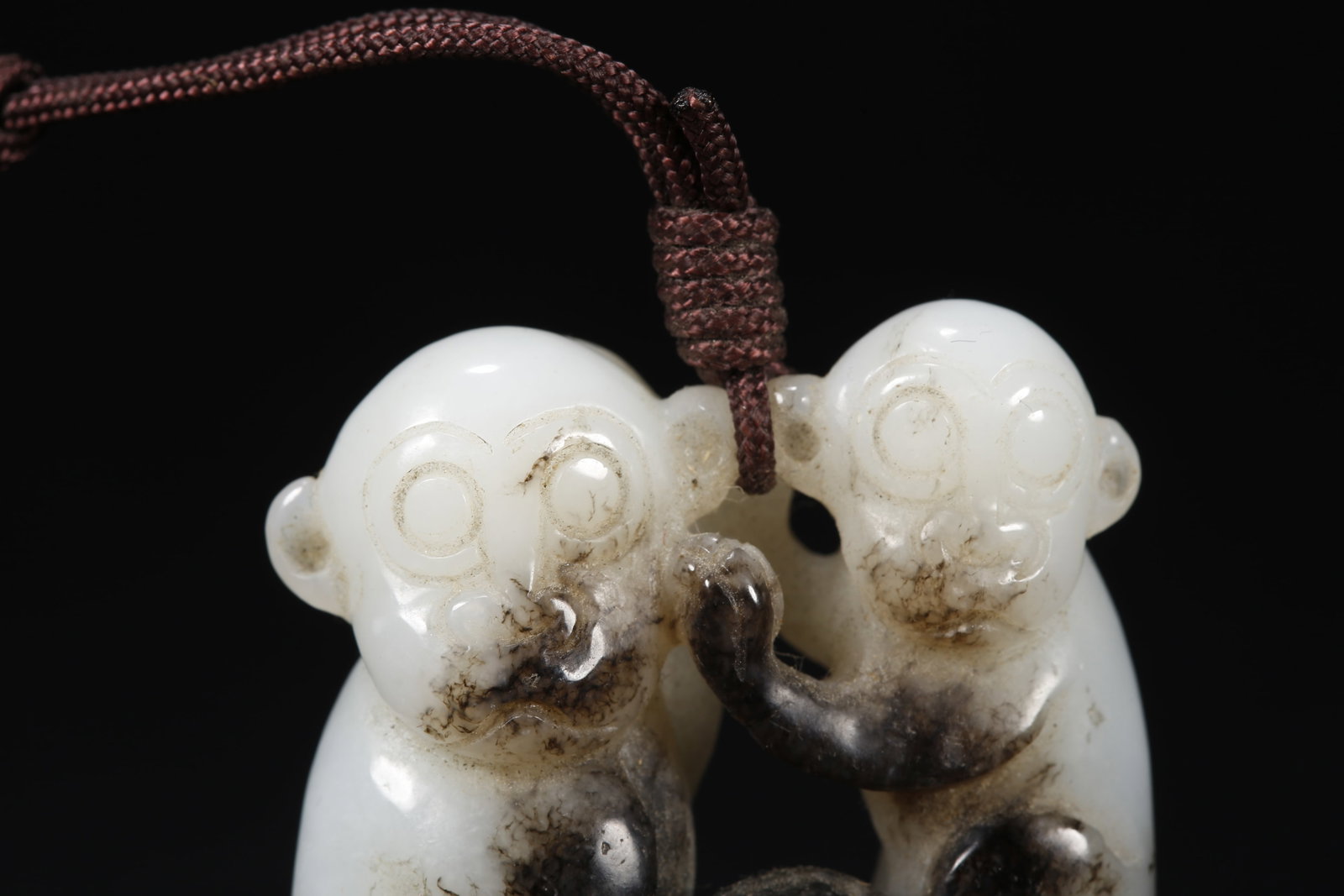 A HETIAN JADE MONKEY-SHAPED HANDLE - 2