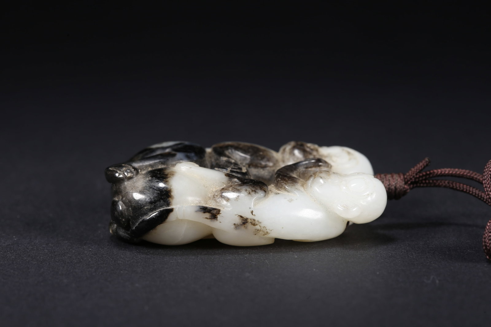 A HETIAN JADE MONKEY-SHAPED HANDLE - 5