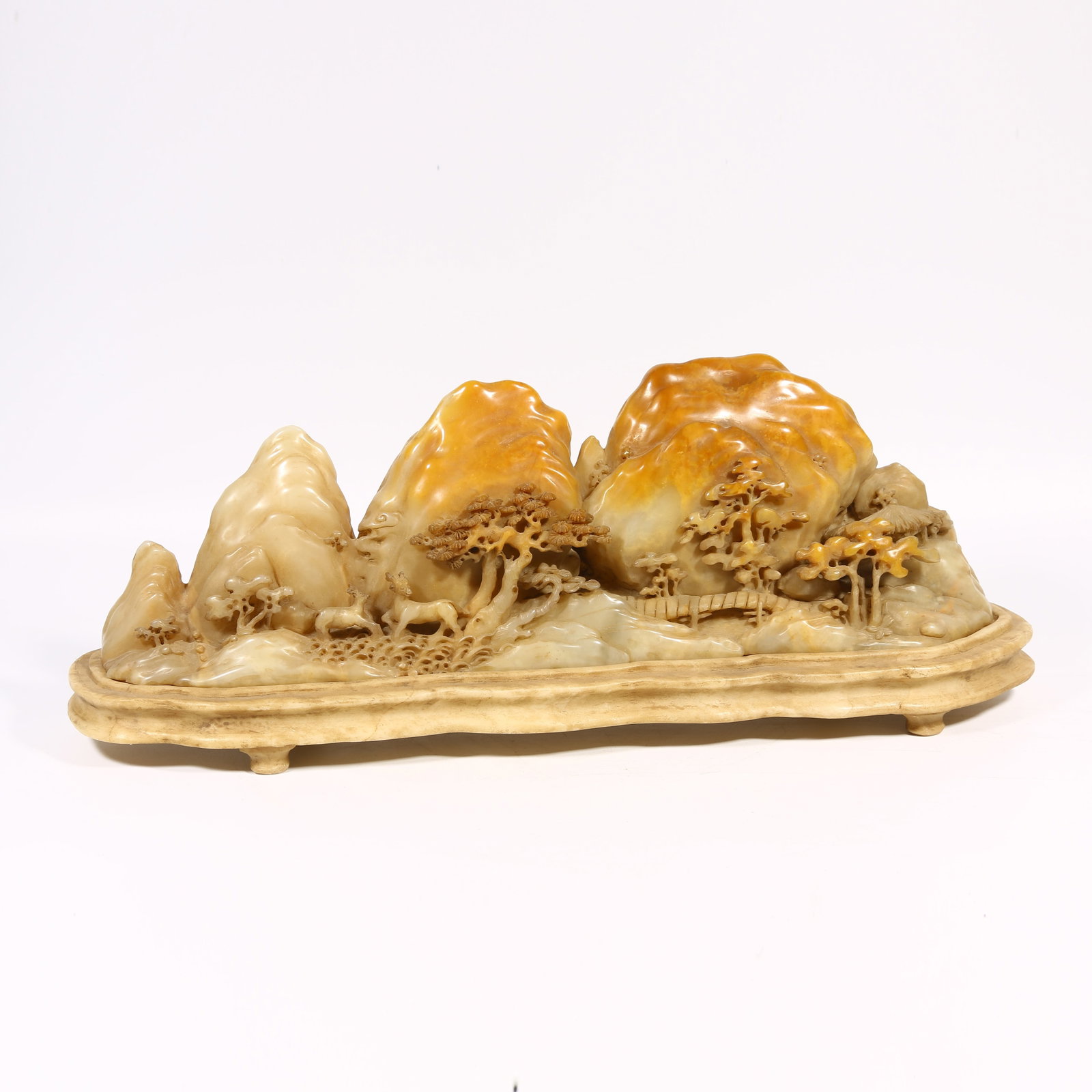 A SHOUSHAN STONE MINIATURE MOUNTAIN WITH PINE AND DEER DESIGN: Shoushan stone miniature mountain with pine and deer design