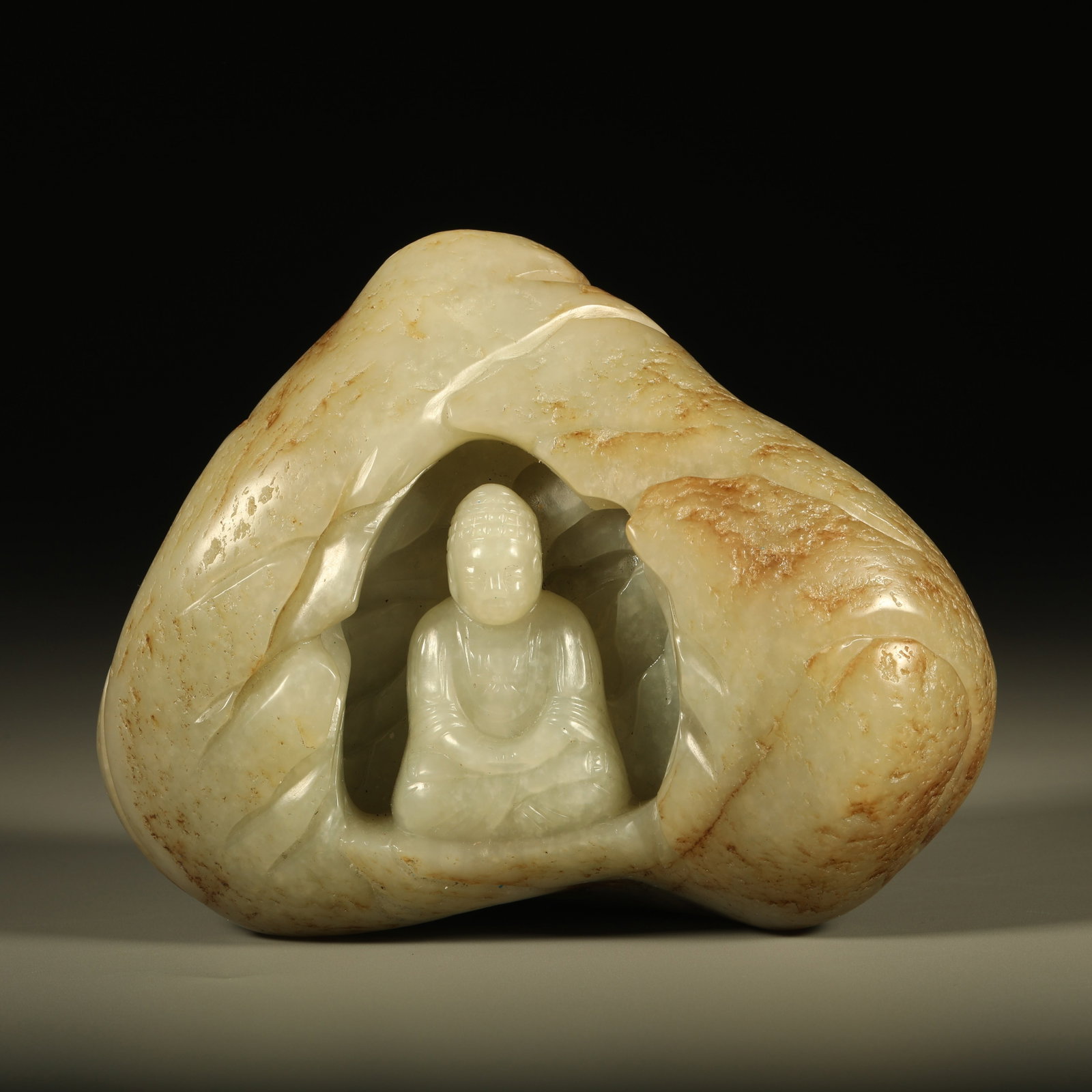 A FREE-FORM HETIAN JADE MOUNTAIN CARVING WITH BUDDHA STATUE (1 of 6)