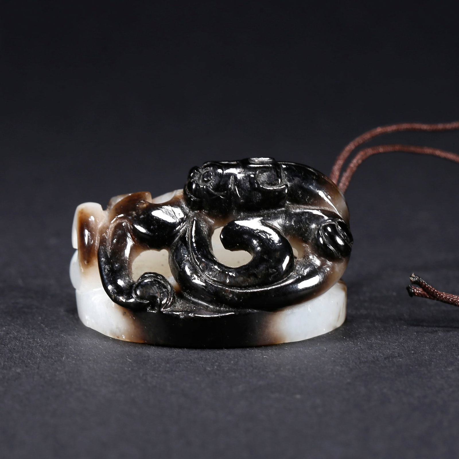 A HETIAN JADE BI DISC WITH CHI-DRAGON MOTIF (1 of 8)