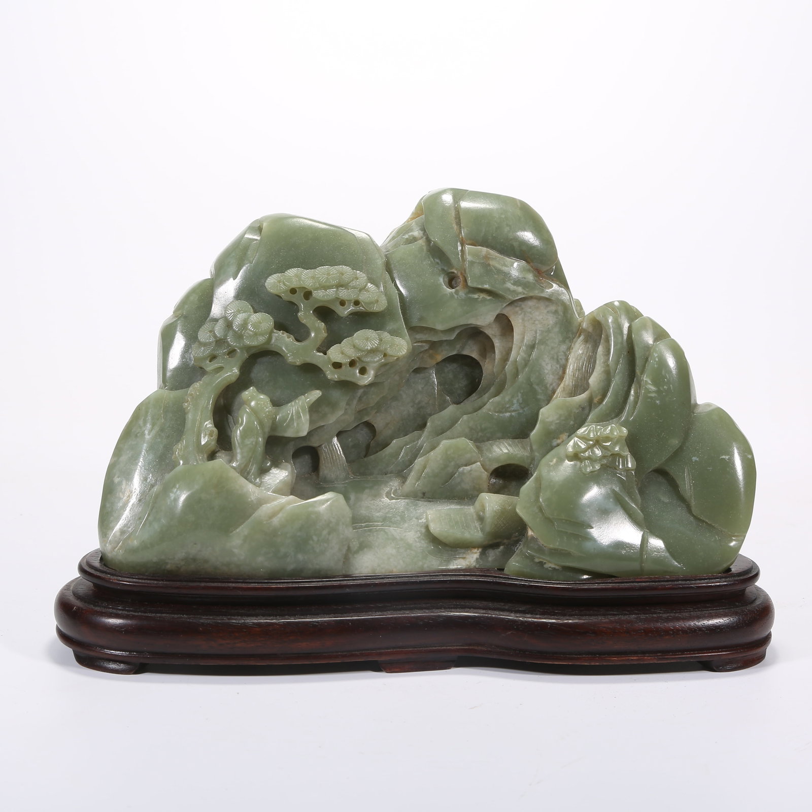 A HETIAN GREEN JADE SCHOLAR UNDER PINE TREE ON MOUNTAIN-STYLE BASE (1 of 8)