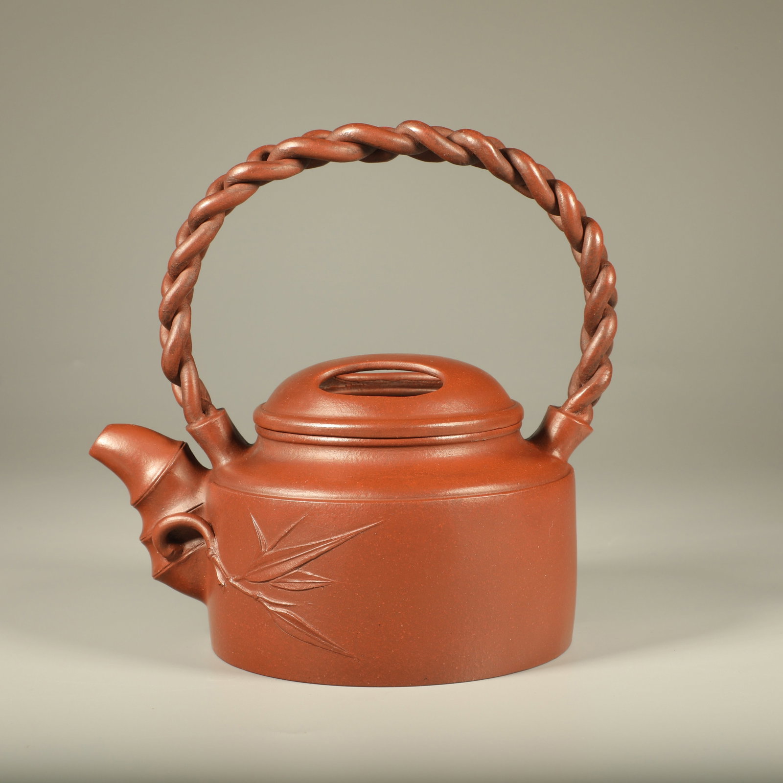 A PURPLE CLAY BAMBOO-JOINT BRAIDED HANDLED POT (1 of 6)