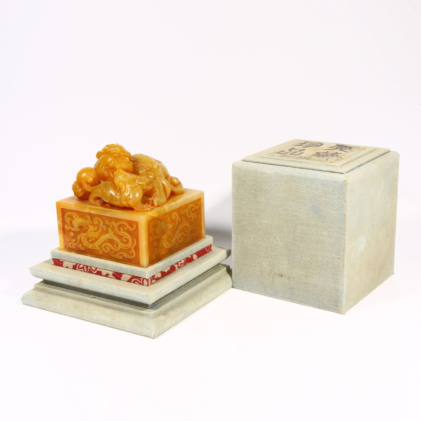 A SHOUSHAN TIANHUANG STONE SEAL WITH BEAST-SHAPED KNOB: Shoushan Tianhuang stone seal with beast-shaped knob