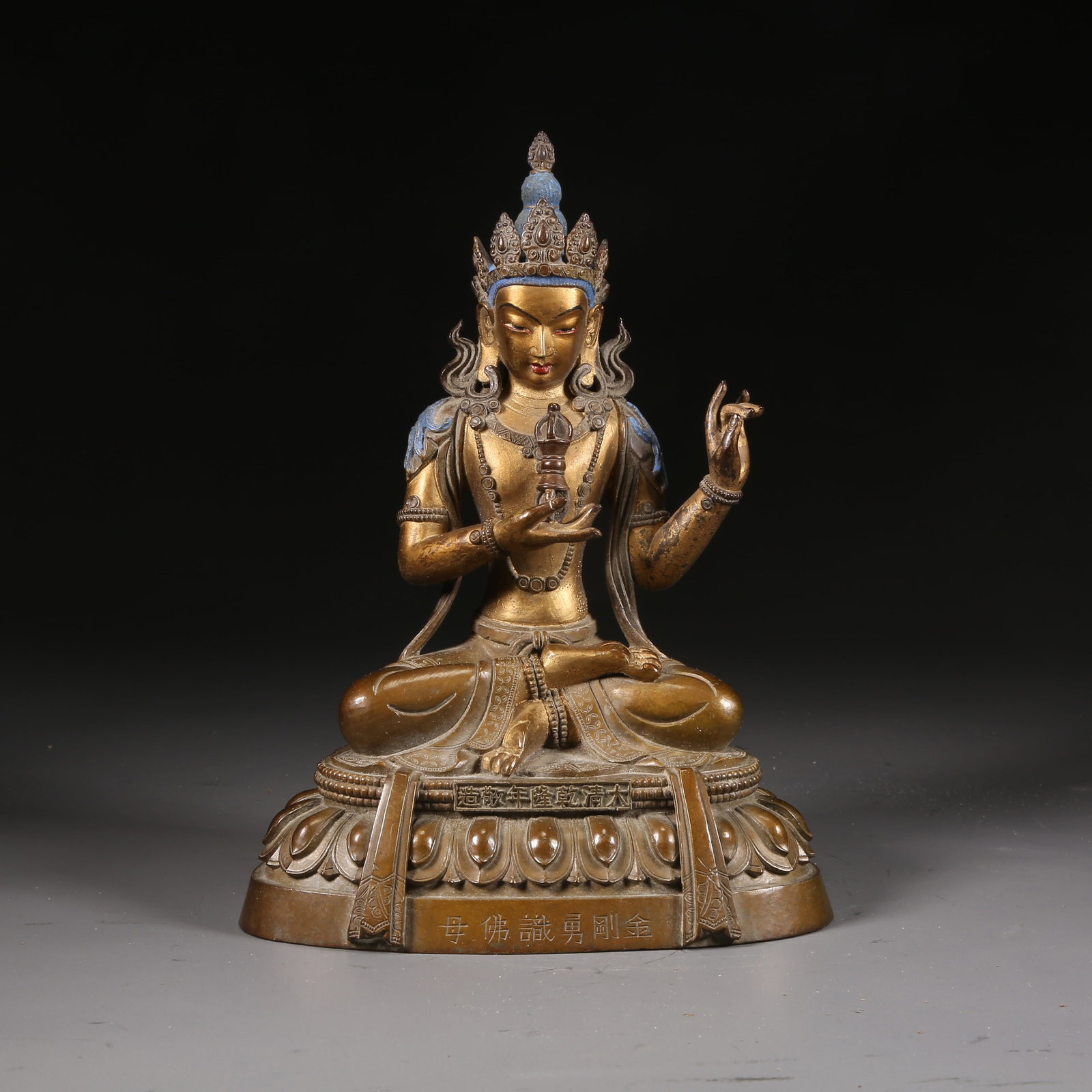A BRONZE STATUE WITH MUD-GILDING IN THE SIX-TIER FOLOU STYLE OF VAJRAVAR?H? (1 of 9)