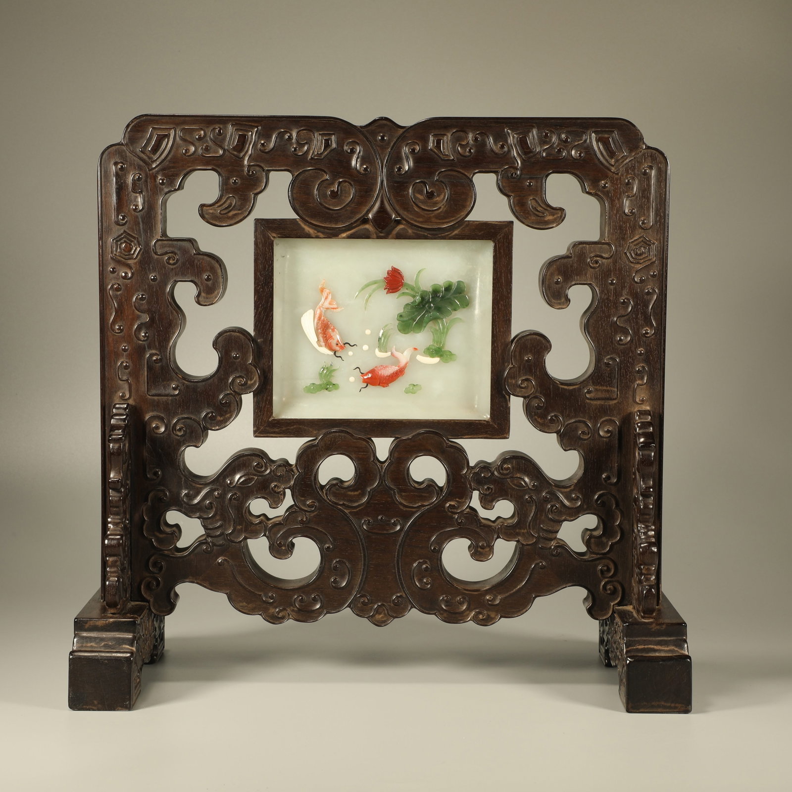 A RED SANDALWOOD TABLE SCREEN CARVED WITH DRAGON PATTERN AND INLAID WITH JADE WEALTH ORNAMENT (1 of 7)