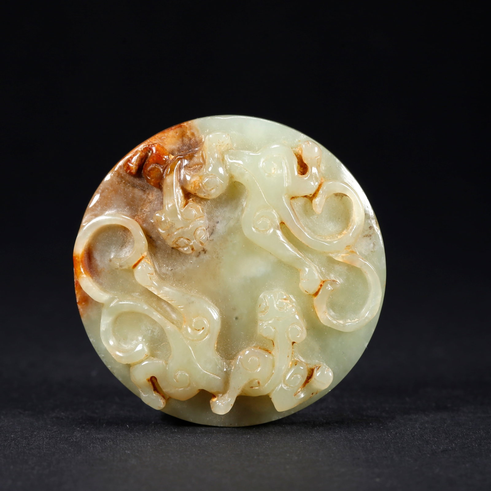 A HETIAN YELLOW JADE DOUBLE-DRAGON PENDANT: Hetian Yellow Jade Double-Dragon Pendant