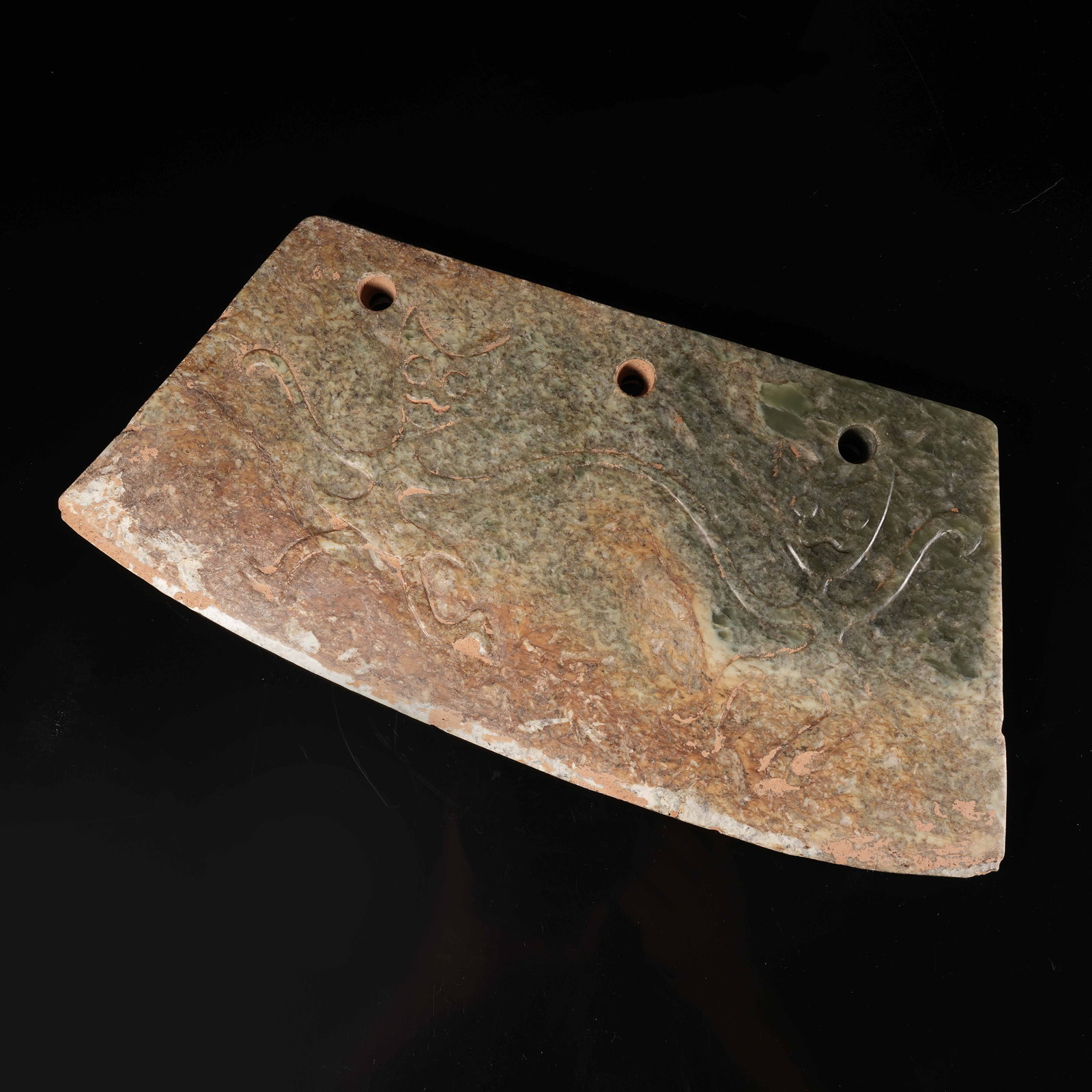 A ANCIENT JADE THREE-HOLE BLADE WITH DIVINE FIGURE PATTERN: Ancient Jade Three-hole Blade with Divine Figure Pattern