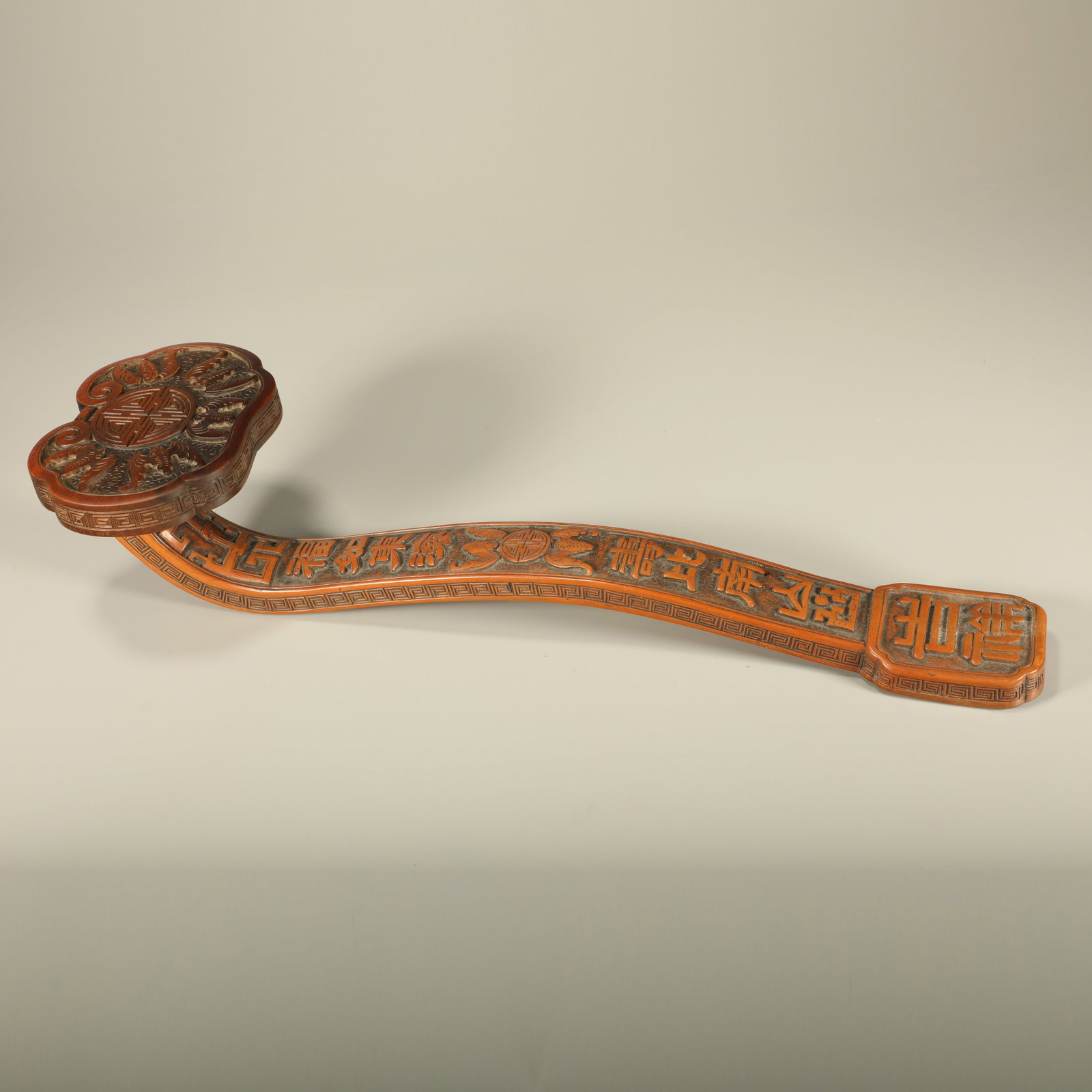 A BOXWOOD RUYI CARVED WITH FIVE BLESSINGS EMBRACING LONGEVITY (1 of 9)