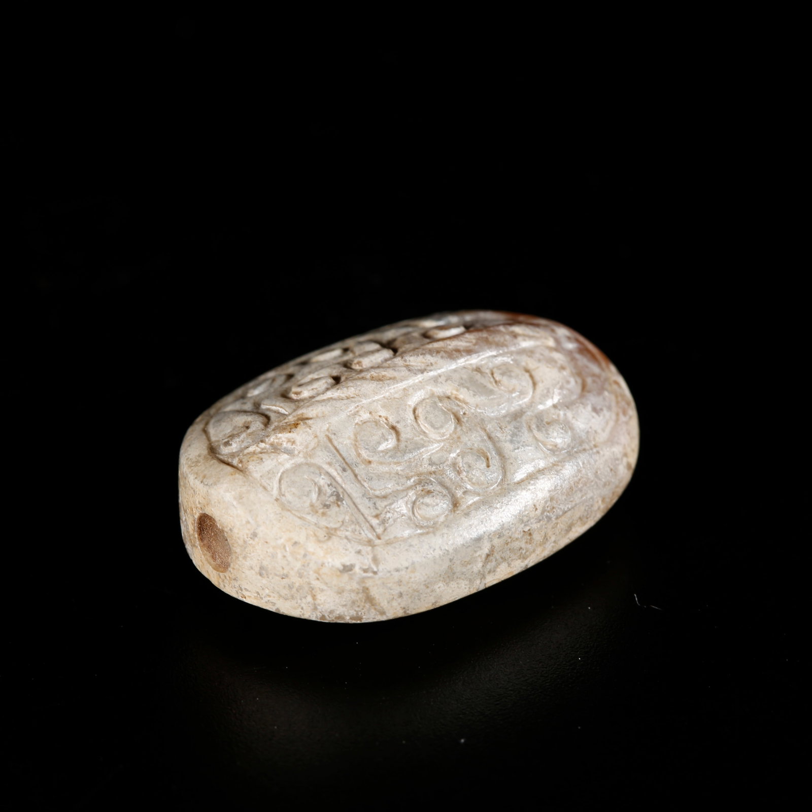 A TORTOISE-SHELL-SHAPED PENDANT CARVED FROM HETIAN JADE: Tortoise-shell-shaped Pendant Carved from Hetian Jade