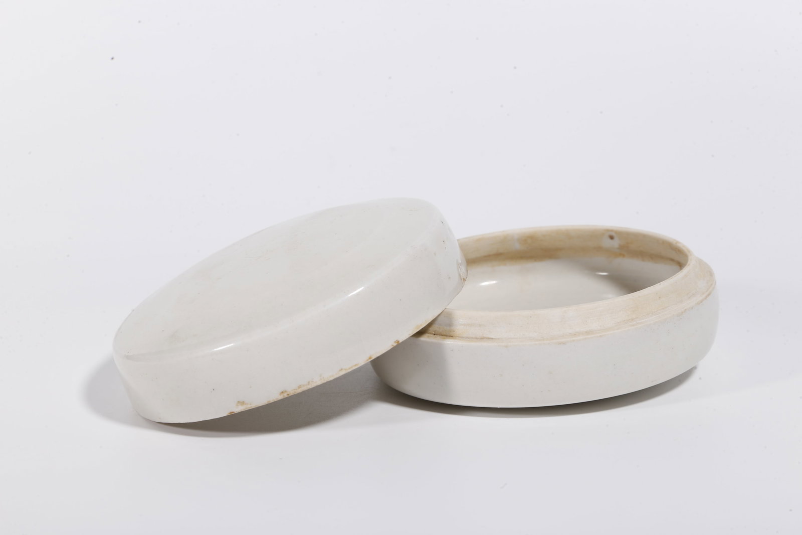 A WHITE GLAZE COVERED BOX - 6