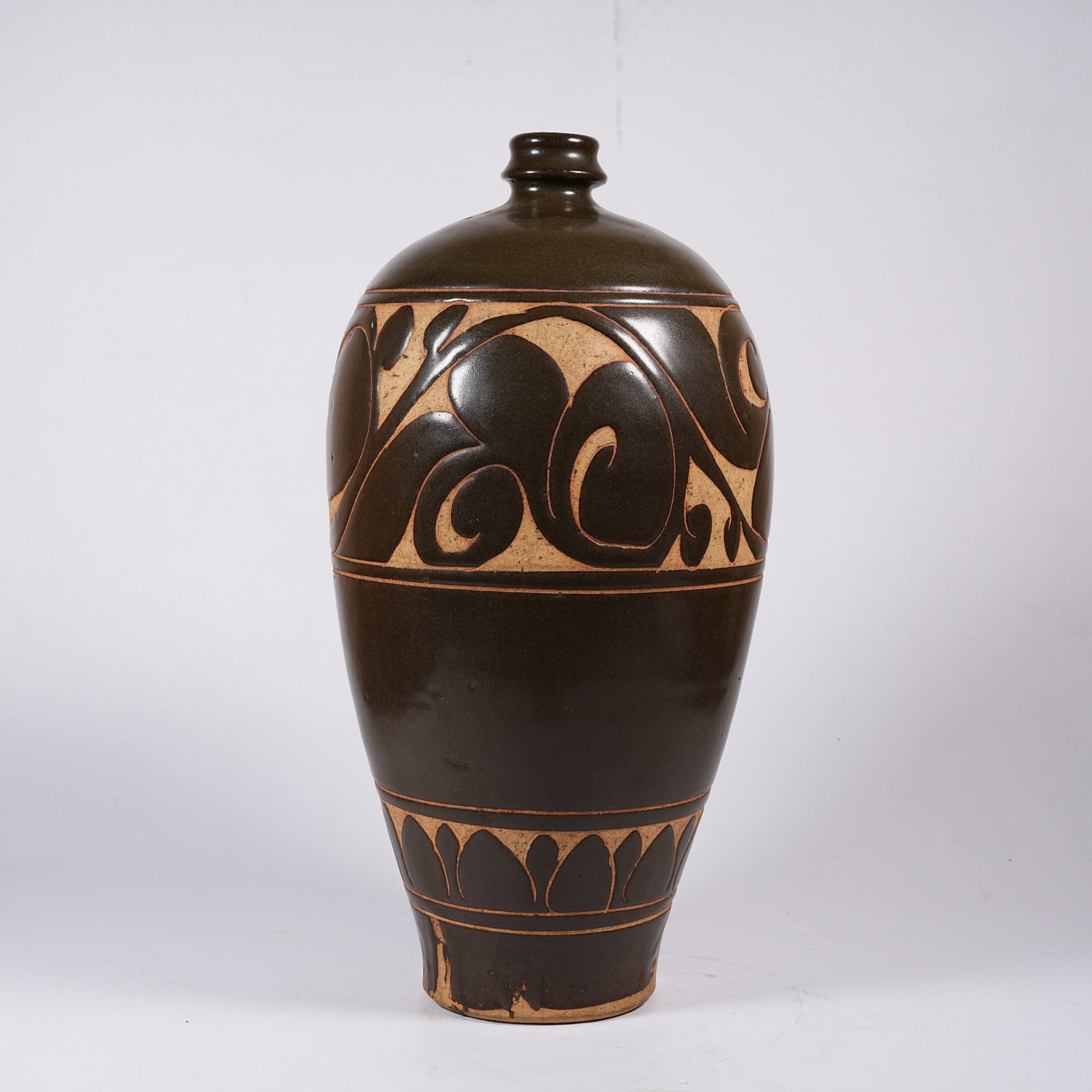 A CIZHOU KILN CARVED PLUM VASE: Cizhou Kiln Carved Plum Vase