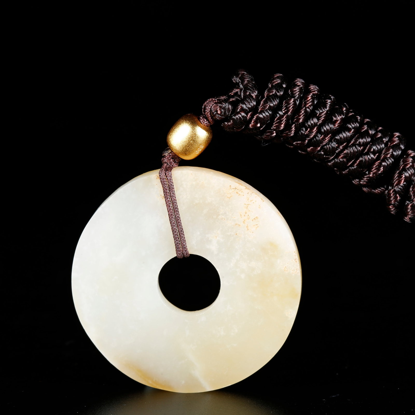 A SMALL LINKED BI DISC OF HETIAN JADE: Small Linked Bi Disc of Hetian Jade