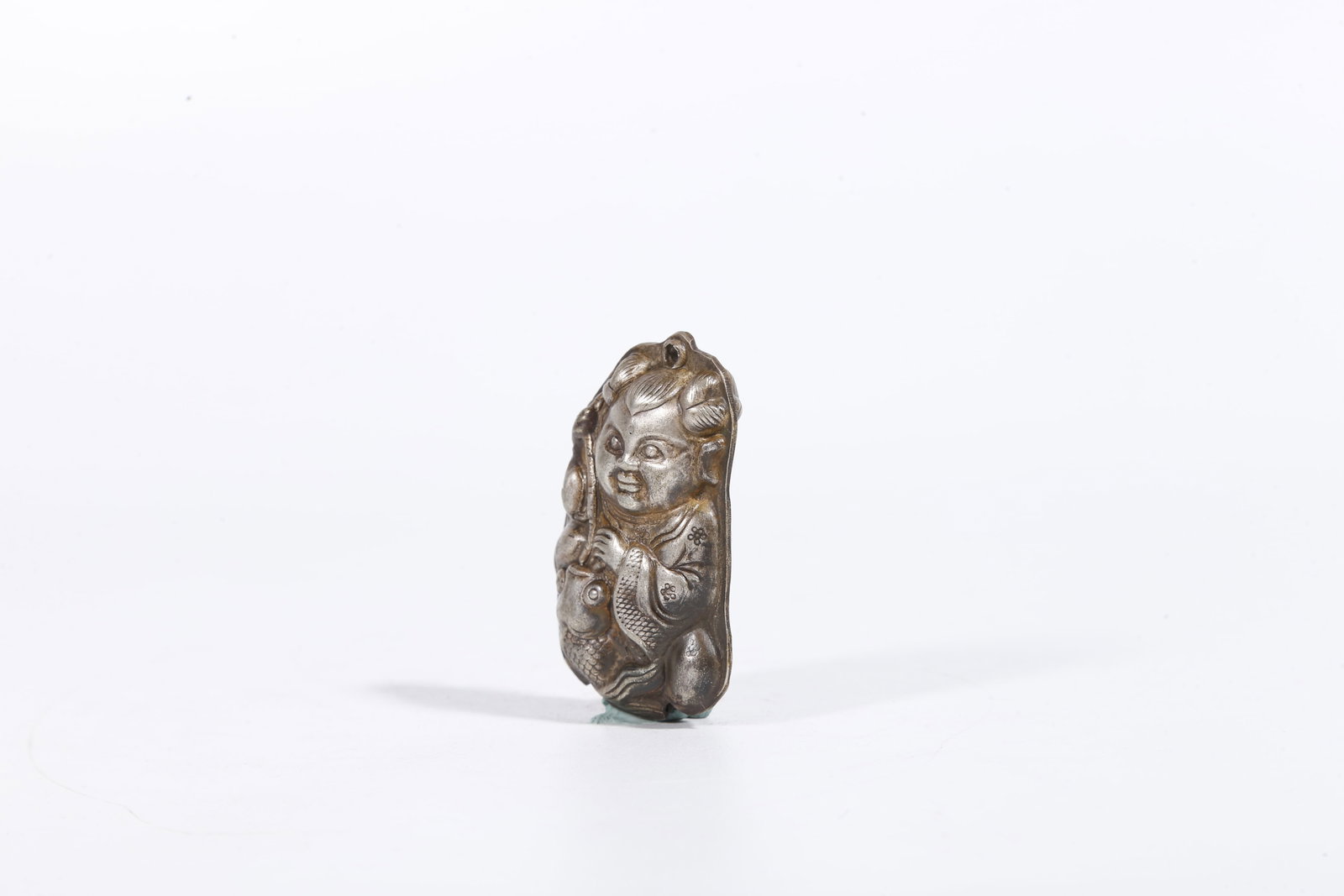 A SILVER BOY PATTERN PENDANT - 5
