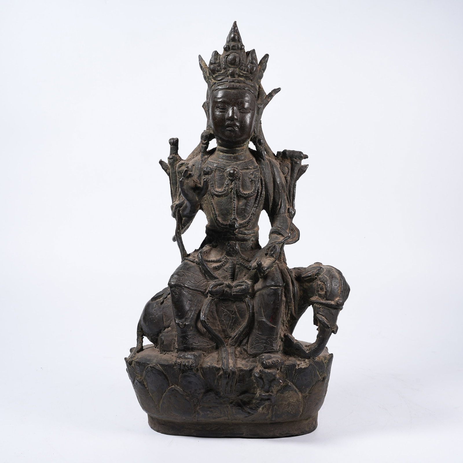 A BRONZE MANJUSHRI STATUE: Bronze Manjushri Statue