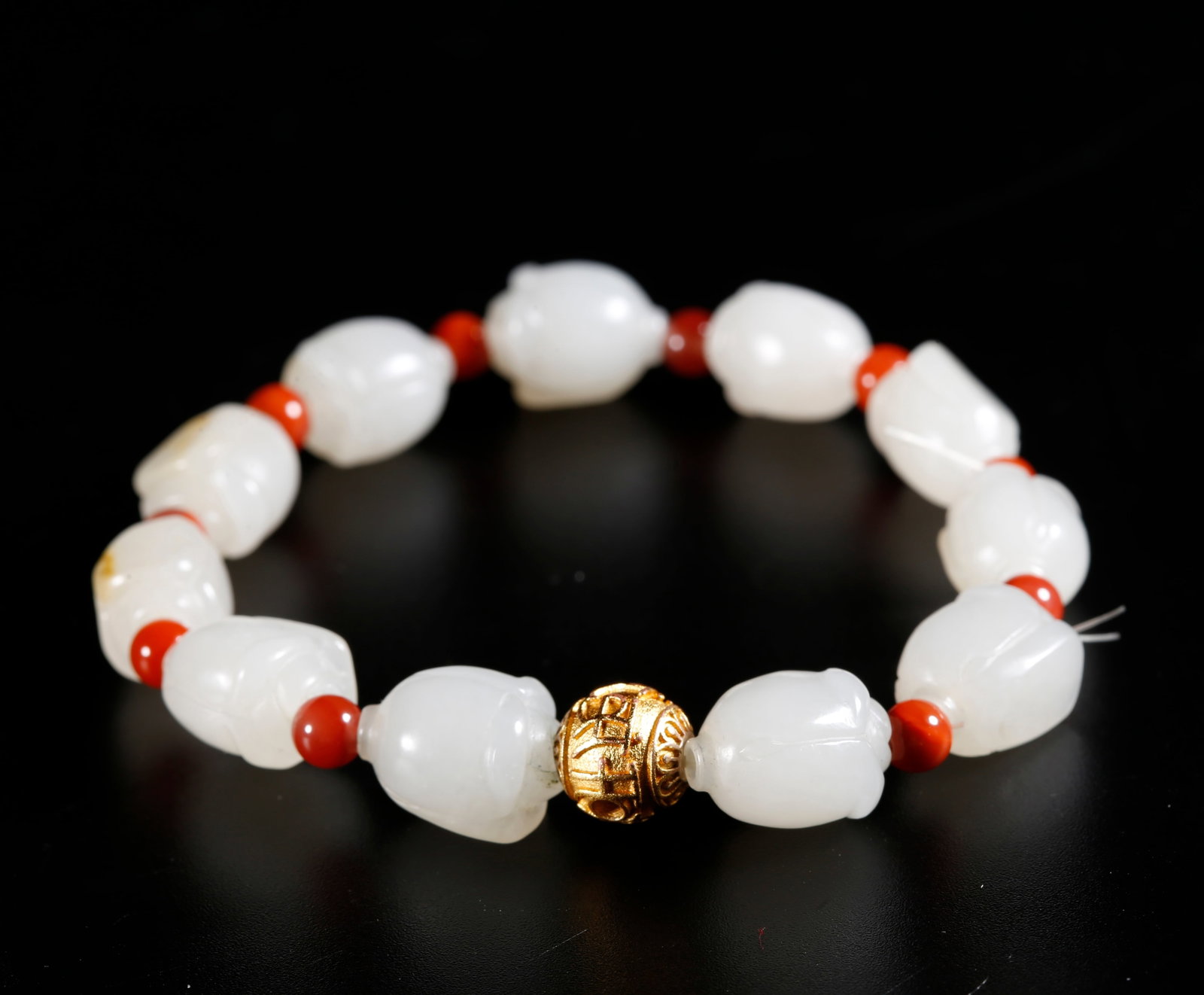 A HETIAN JADE CARVED BRACELET (1 of 8)