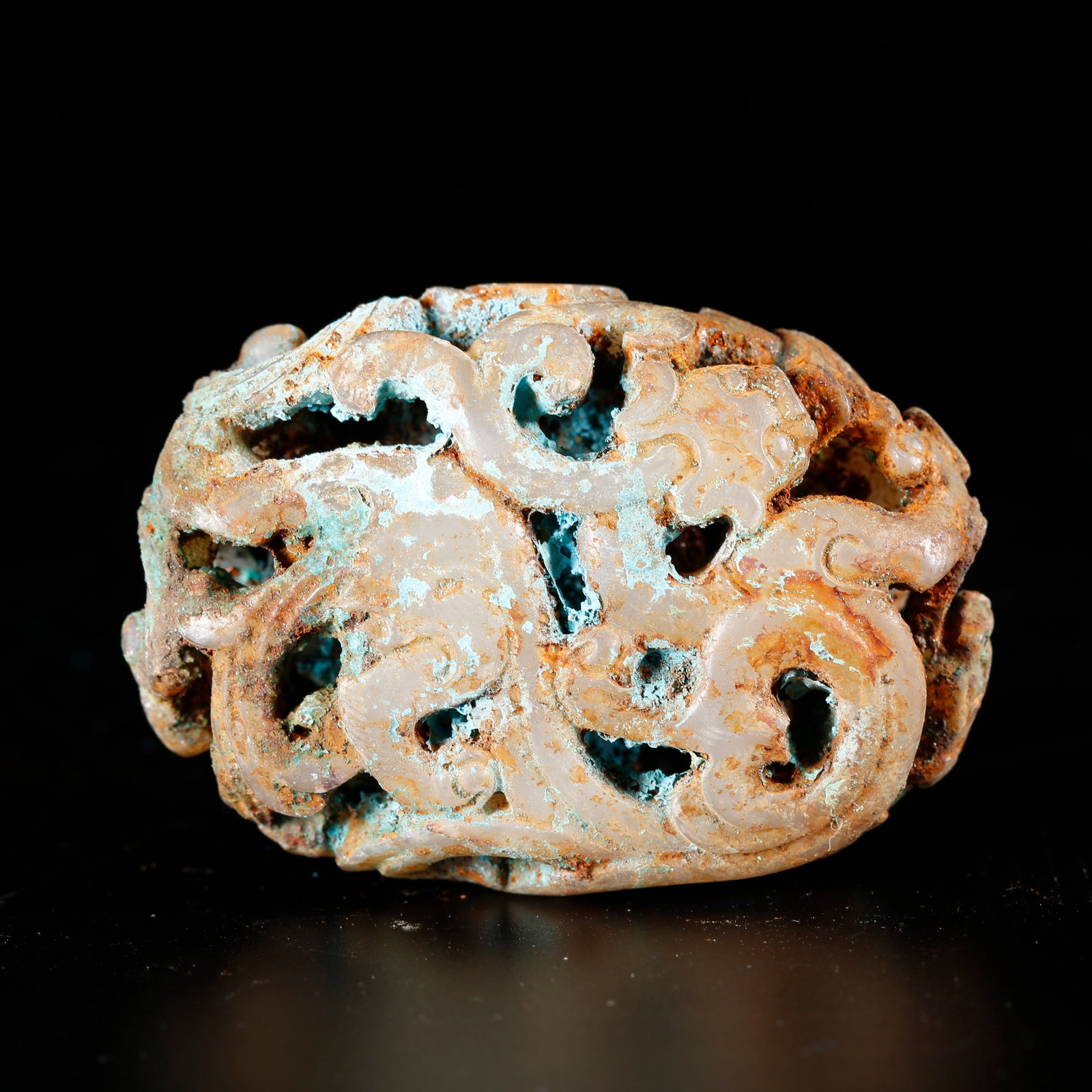 A DRAGON-PATTERNED PENDANT CARVED FROM HETIAN JADE: Dragon-patterned Pendant Carved from Hetian Jade