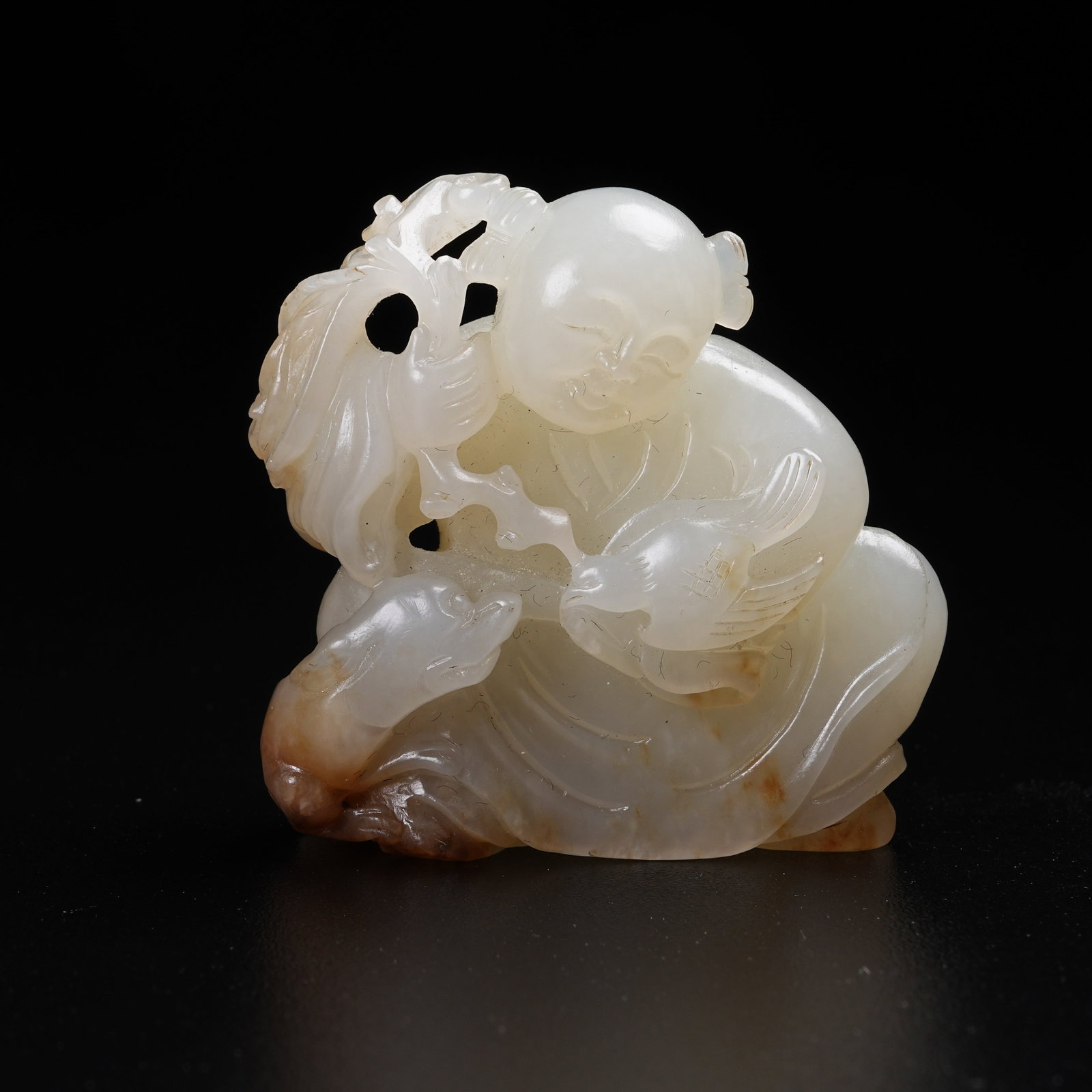 A HETIAN JADE PENDANT OF BOY PLAYING WITH DOG (1 of 9)