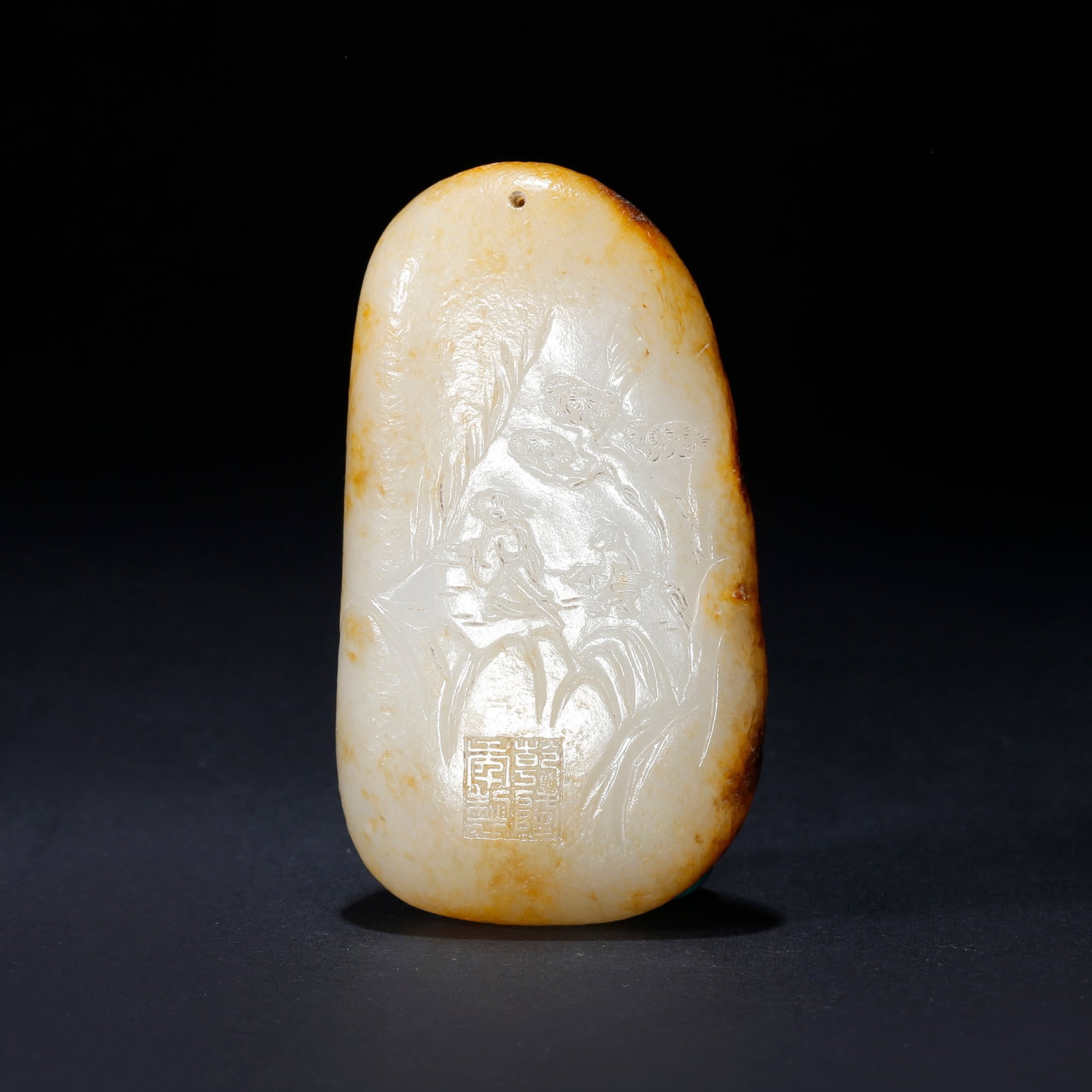 A HETIAN JADE CARVED FIGURE ORNAMENT (1 of 10)