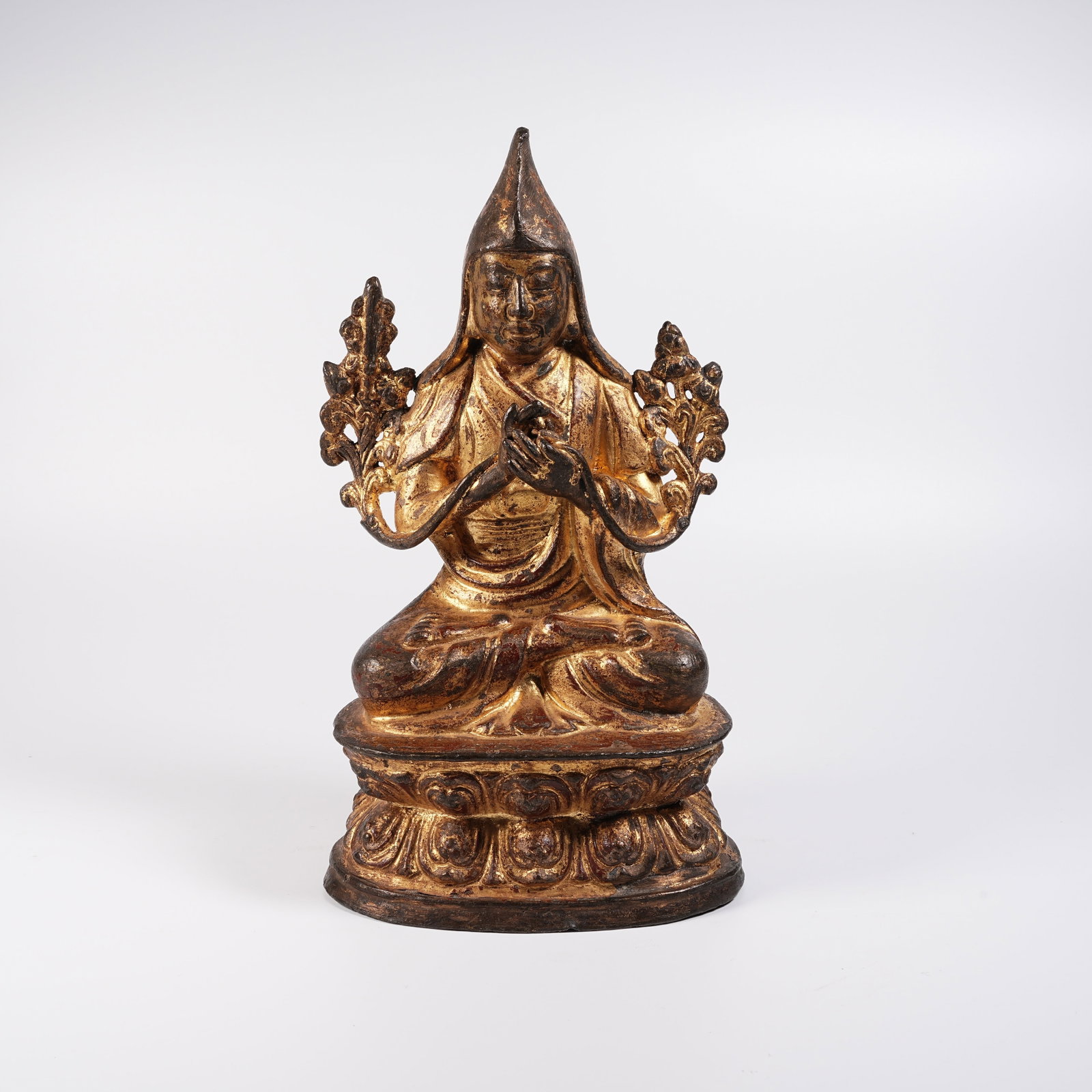 A GILT LACQUERED BRONZE LAMA STATUE: Gilt Lacquered Bronze Lama Statue