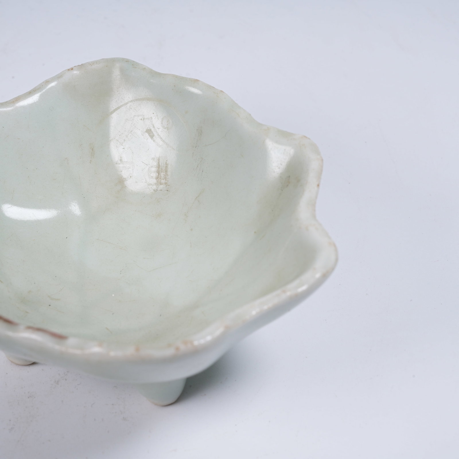 A CELADON LEAF-SHAPED WASHER - 7