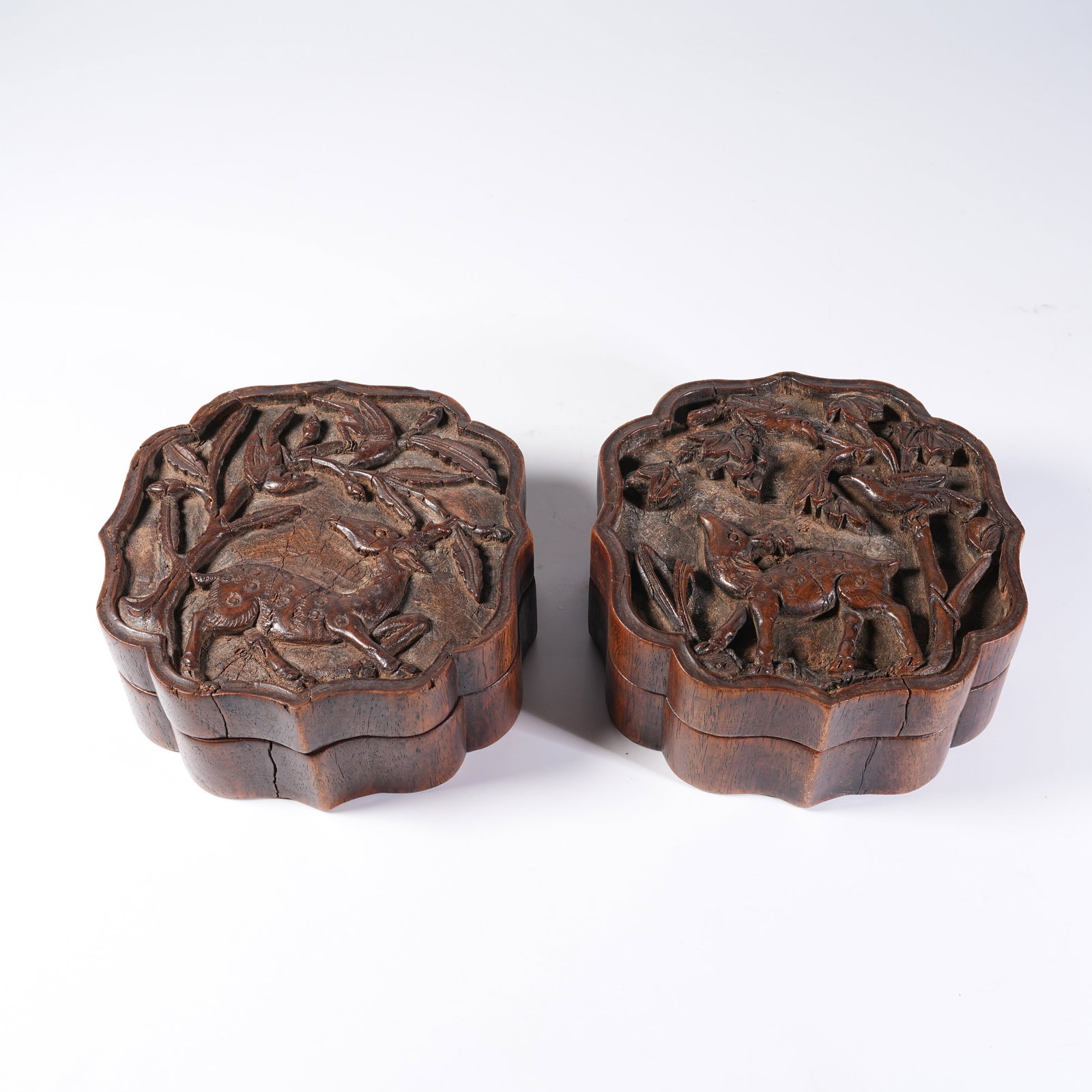 A HUANGHUALI COVERED BOX WITH AUTUMN MOUNTAIN PATTERN: Huanghuali Covered Box with Autumn Mountain Pattern