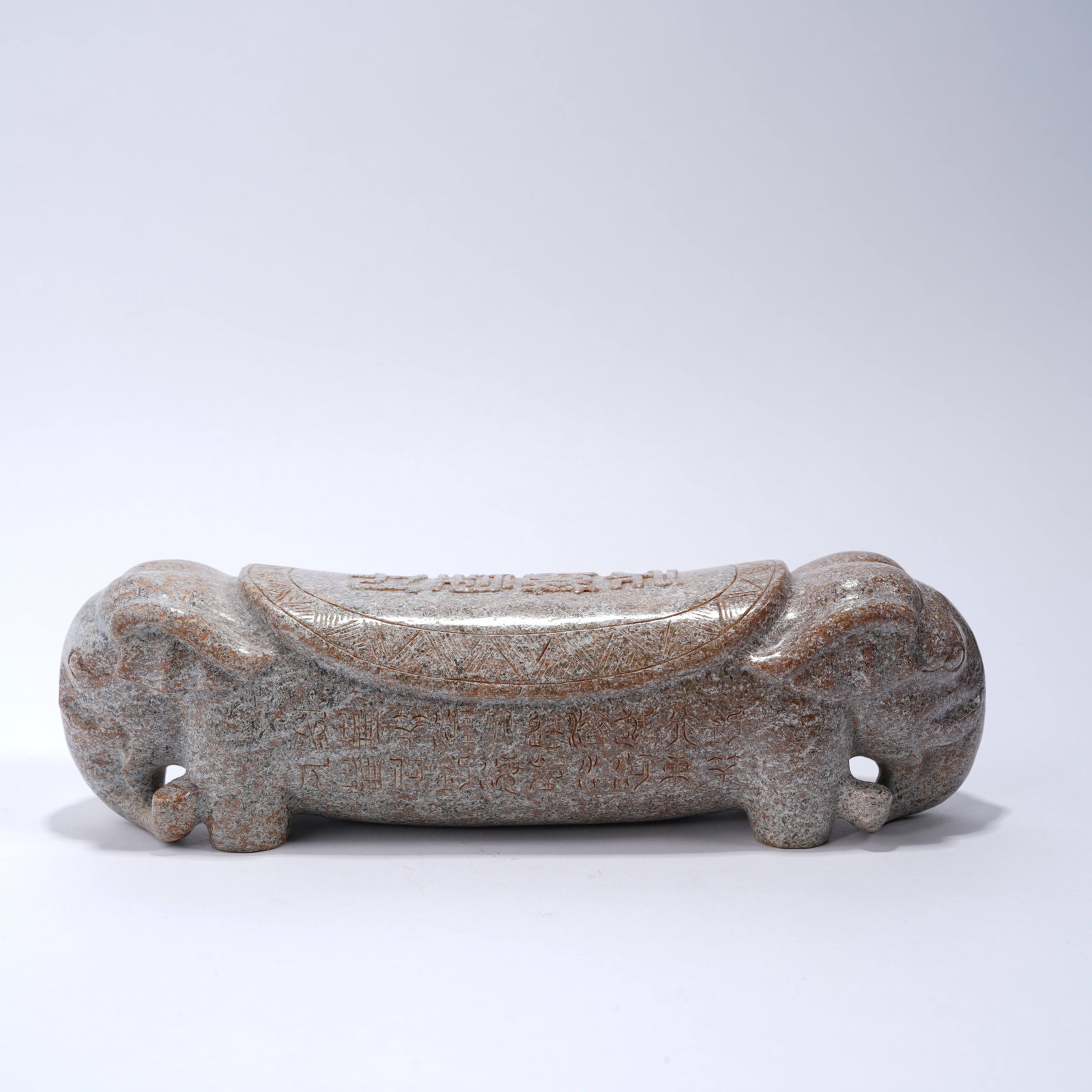 A ANCIENT JADE DOUBLE-ELEPHANT PILLOW: Ancient jade double-elephant pillow