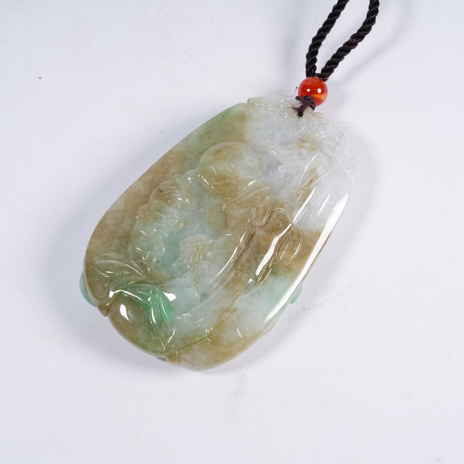 A JADEITE KYLIN AUSPICIOUS PATTERN PENDANT - 9