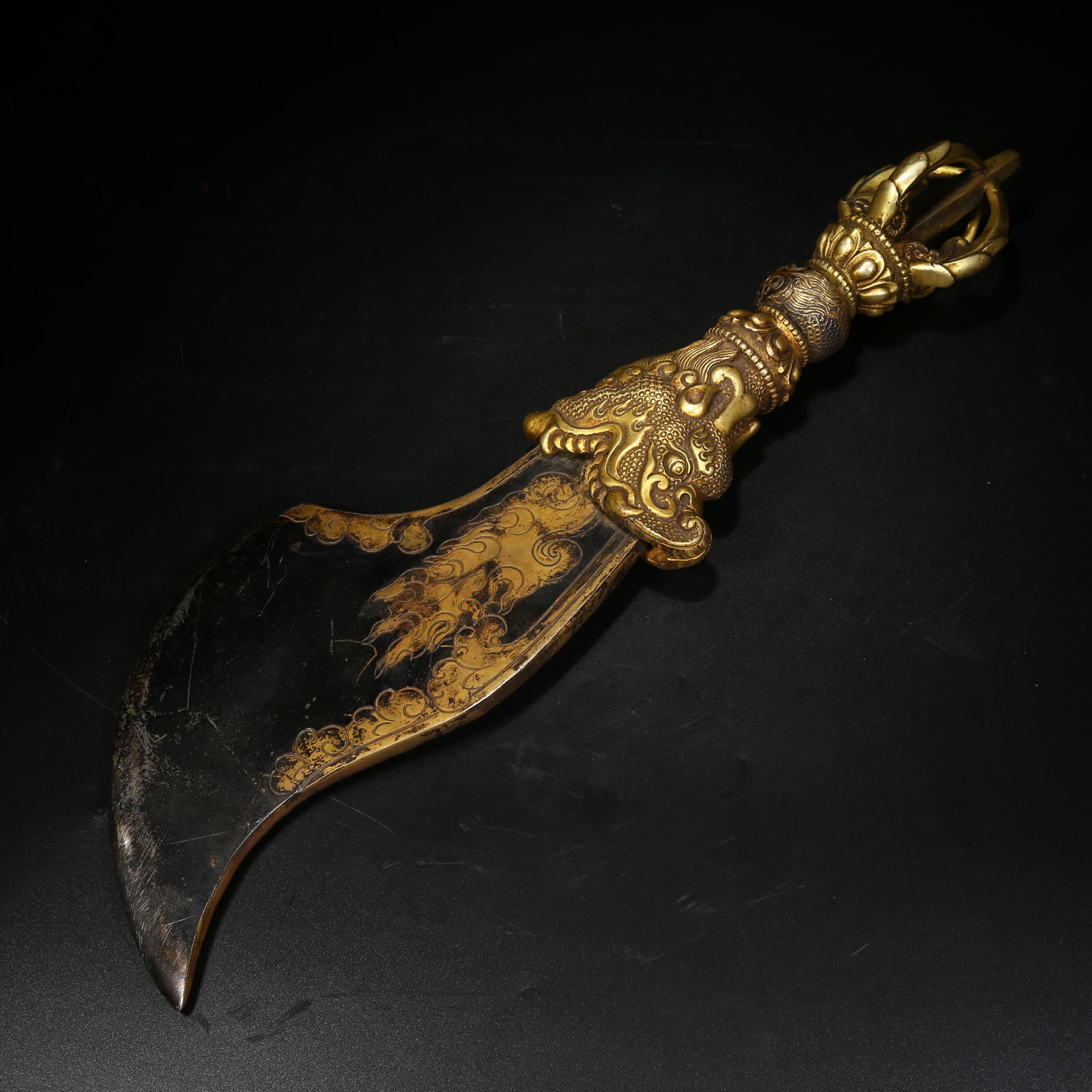 A GILDED BRONZE RITUAL VAJRA AXE WEAPON (1 of 8)