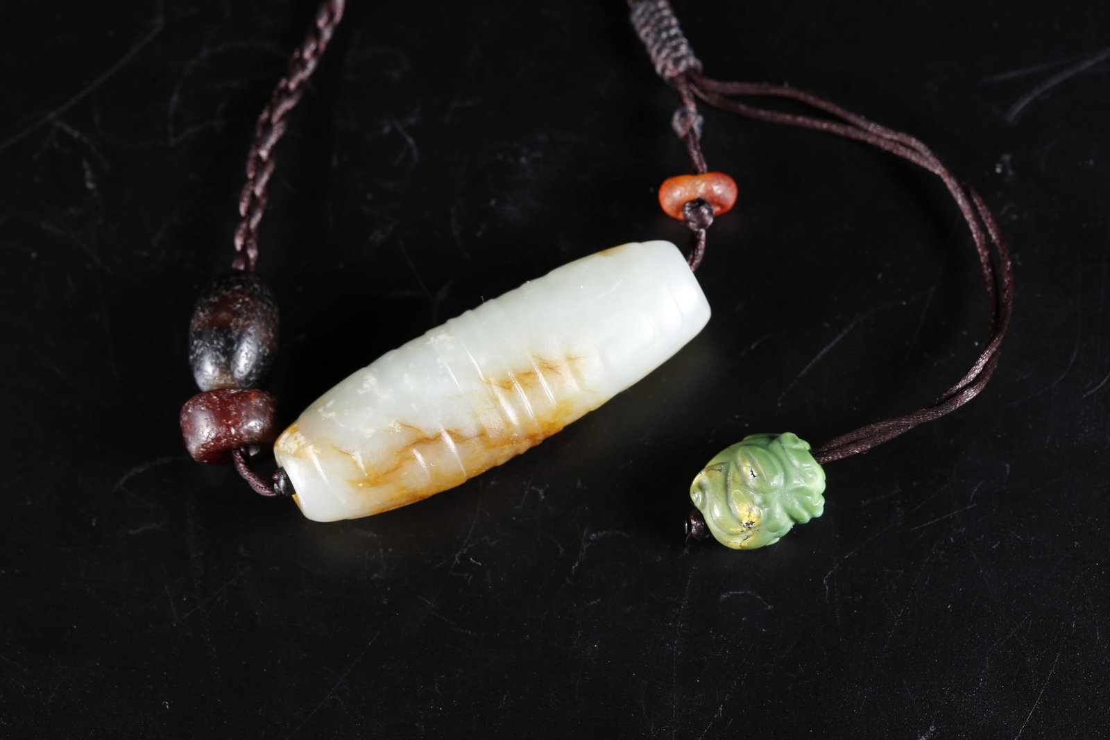 A HETIAN JADE PENDANT (1 of 10)