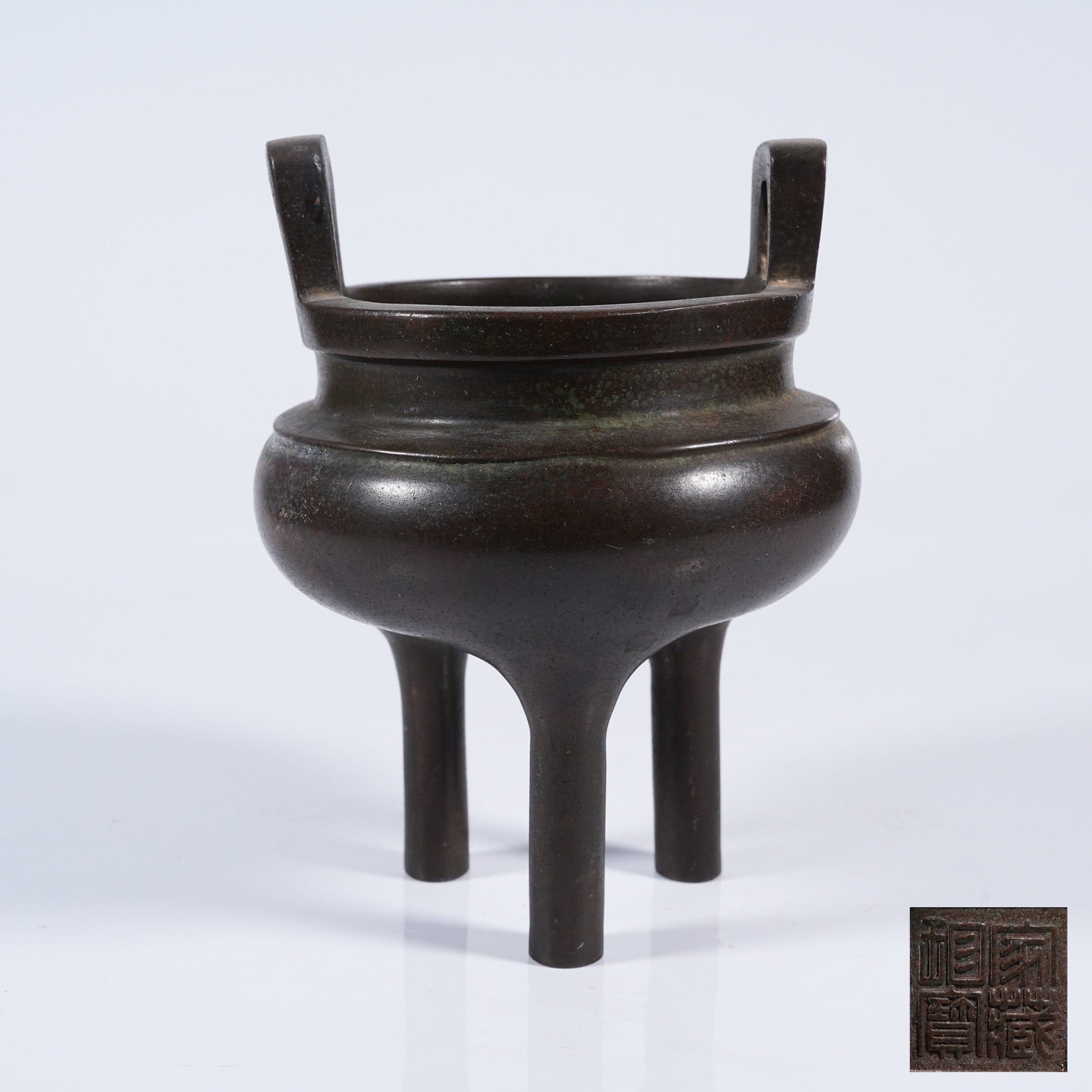 A BRONZE THREE-LEGGED OFFICIAL-HAT-EAR INCENSE BURNER (1 of 9)