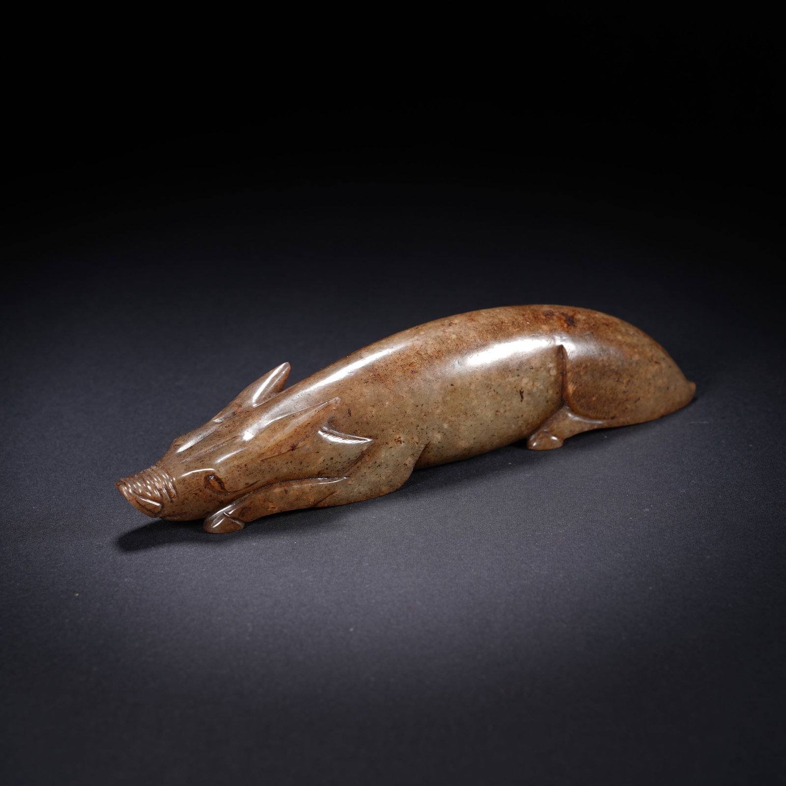 A ANCIENT JADE RECUMBENT PIG ORNAMENT (1 of 7)
