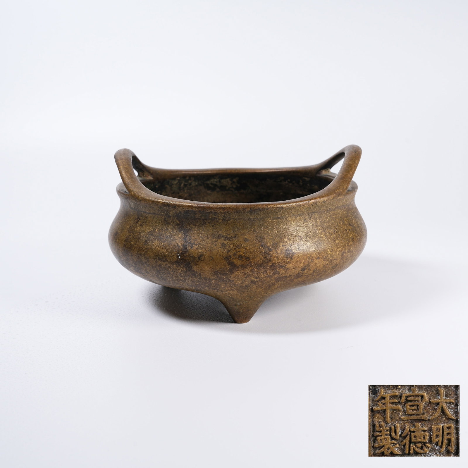 A GILT BRONZE BRIDGE-EARED CENSER (1 of 9)