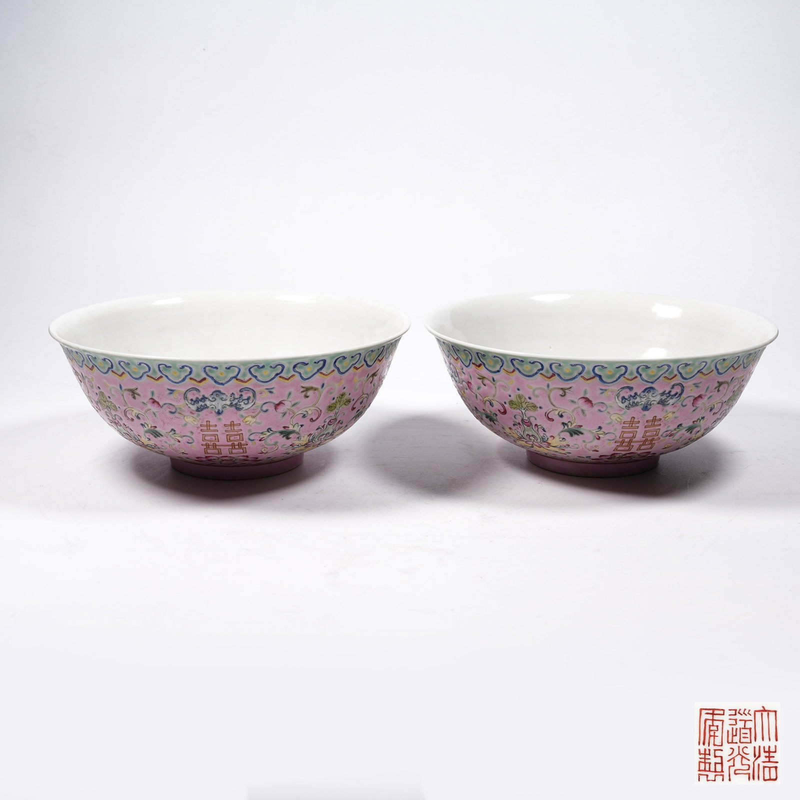 A SET OF ROUGE RED GROUND FAMILLE ROSE LARGE BOWLS WITH INTERLOCKING TREASURE FLORAL AND AUSPICIOUS: Set of Rouge Red Ground Famille Rose Large Bowls with Interlocking Treasure Floral and Auspicious Pattern