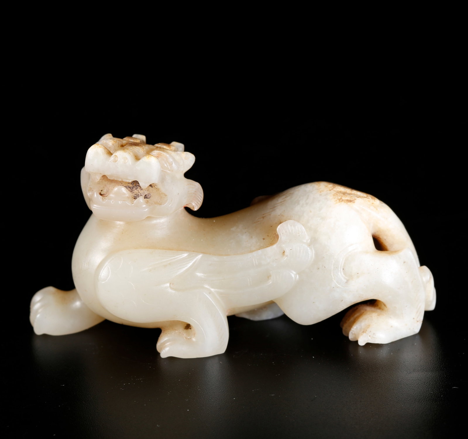 A CHIHU TIGER-SHAPED ORNAMENT CARVED FROM HETIAN JADE (1 of 9)